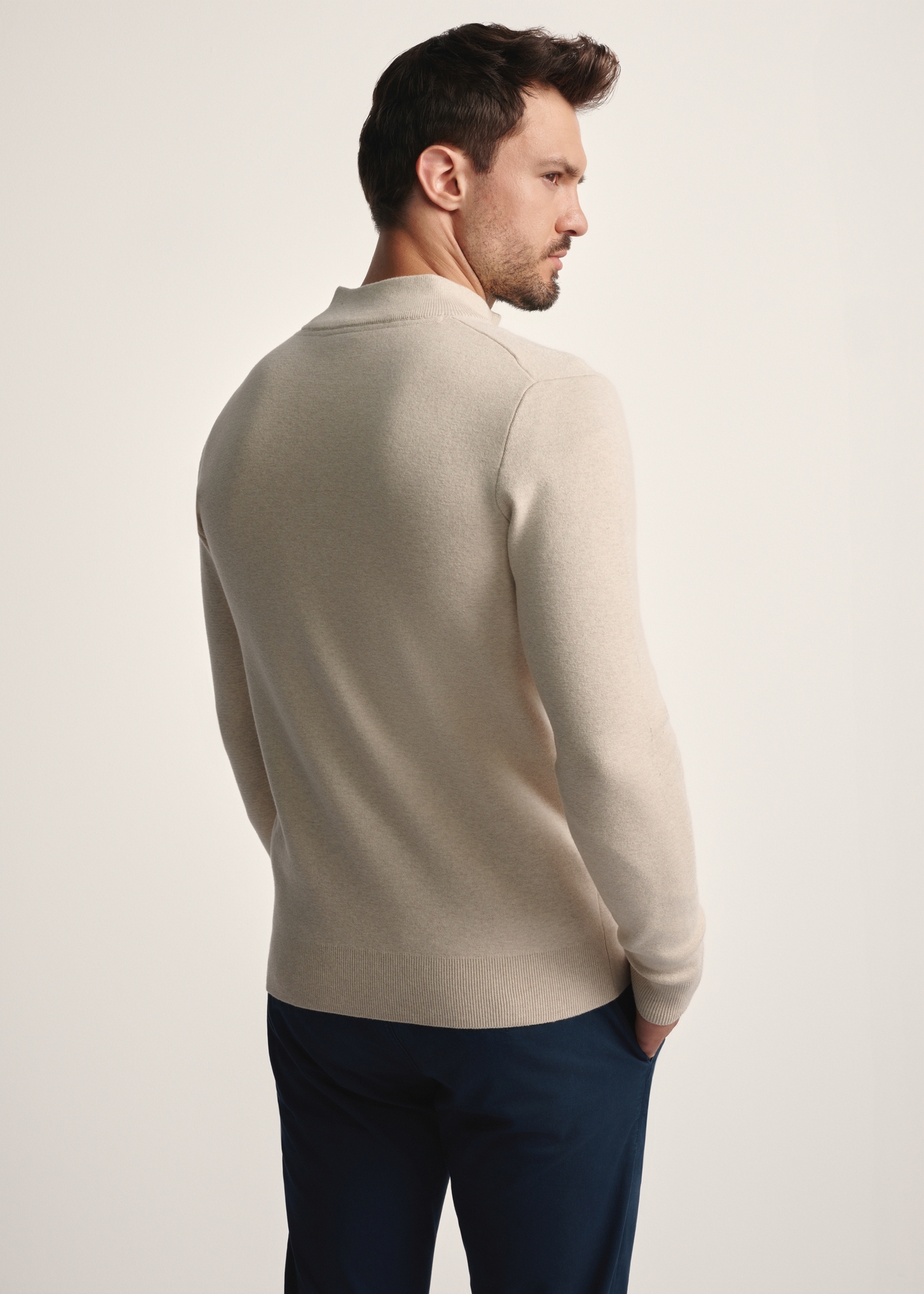 Beige men's cardigan SWEMT-0149-81(Z25), back view of the product on the model. Half of the silhouette visible.