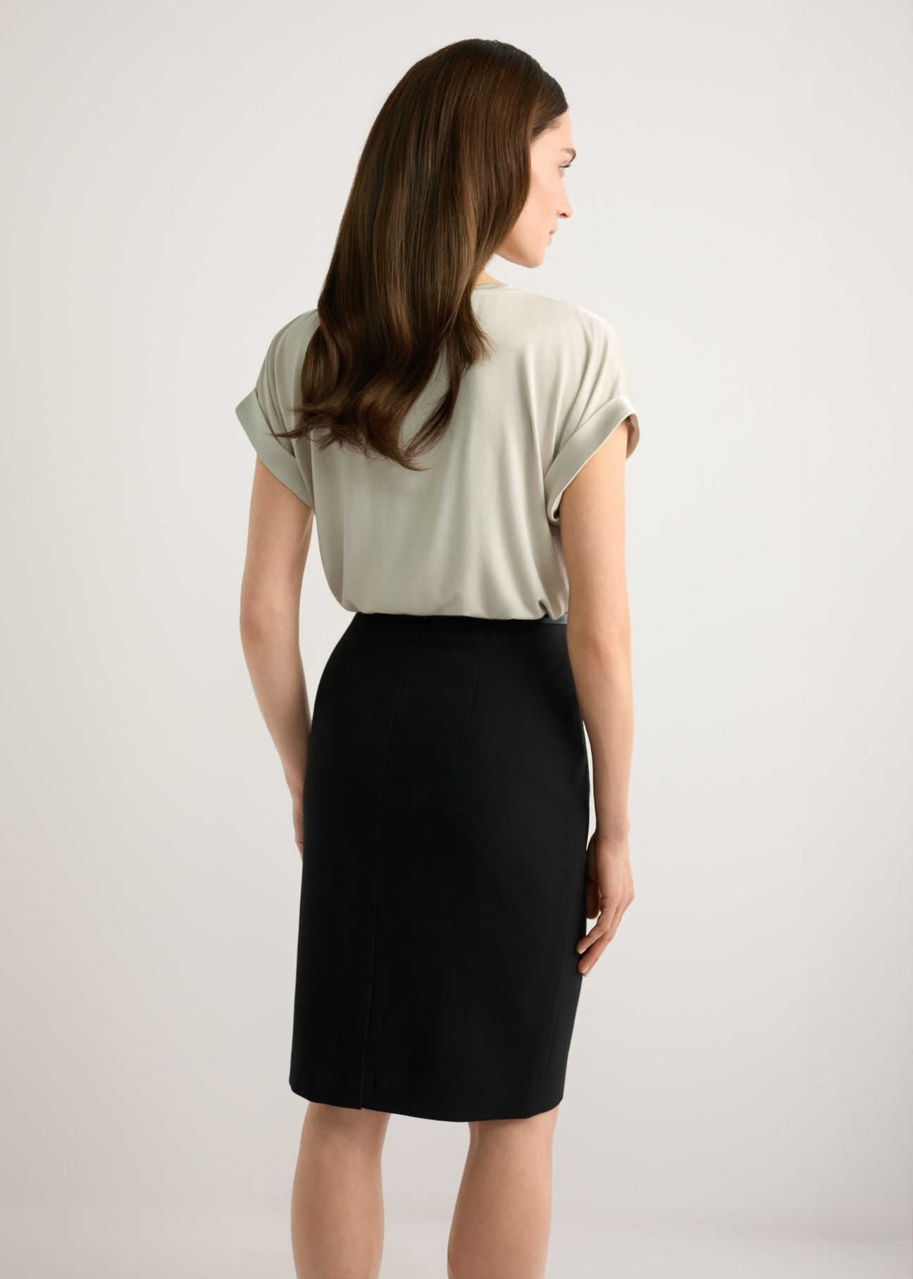 Light beige women's blouse BLUDT-0205-1A(W26), back view of the product on the model. Half of the silhouette visible.