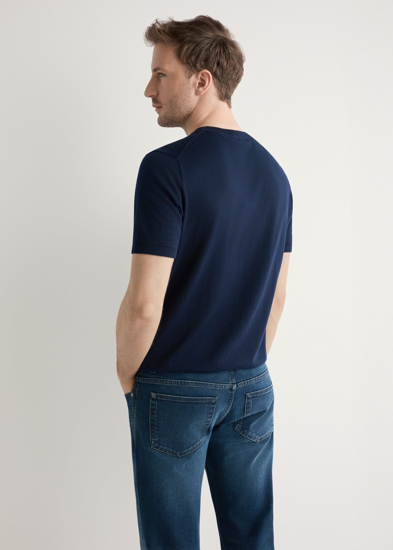 Men's navy blue silk T-shirt TSHMT-0138-7E(W26), product view from the back on the model, half of the silhouette visible.