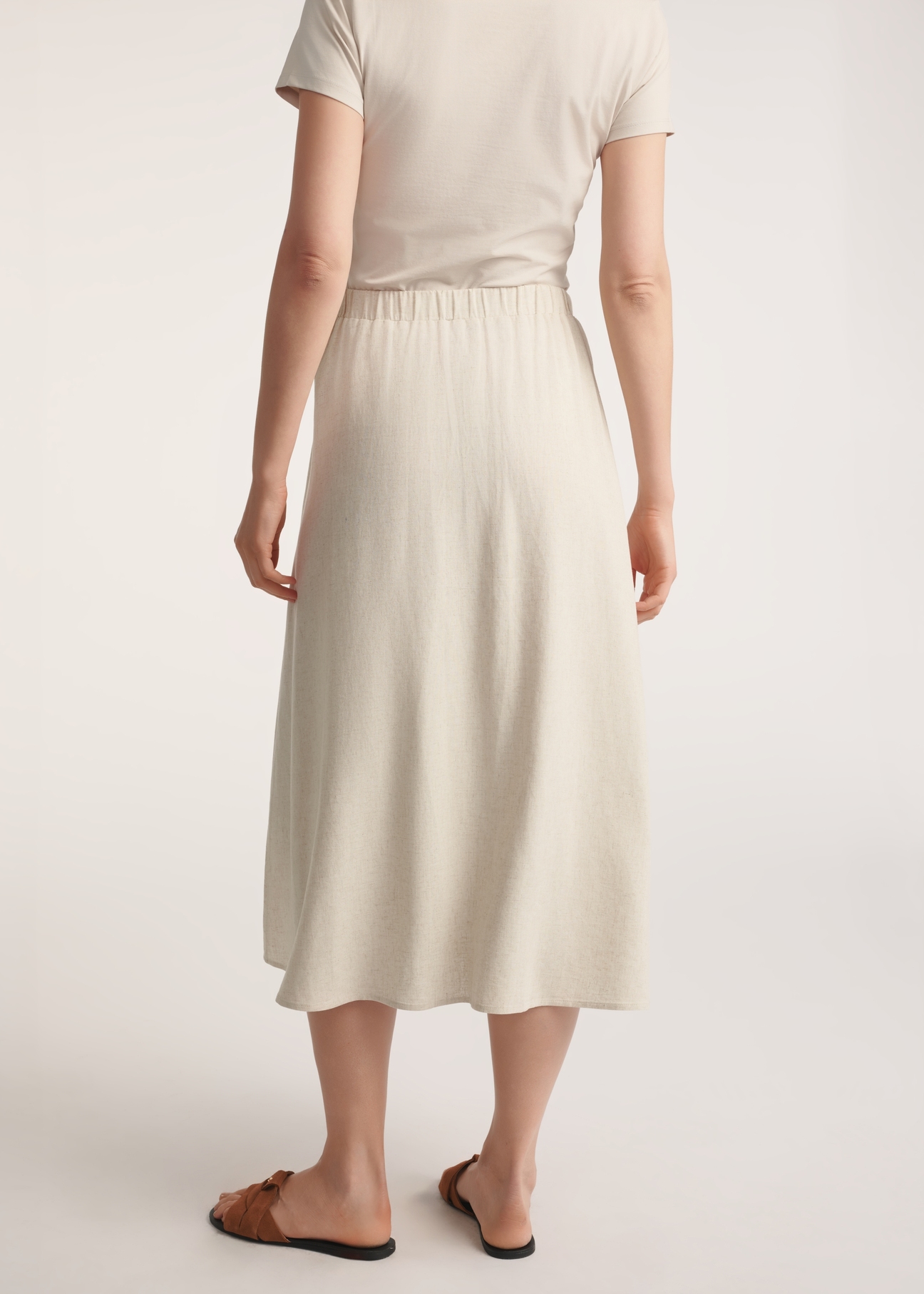 Beige midi skirt with linen SPCDT-0120-81(W25) - product view from the back on a white background. Full silhouette visible.