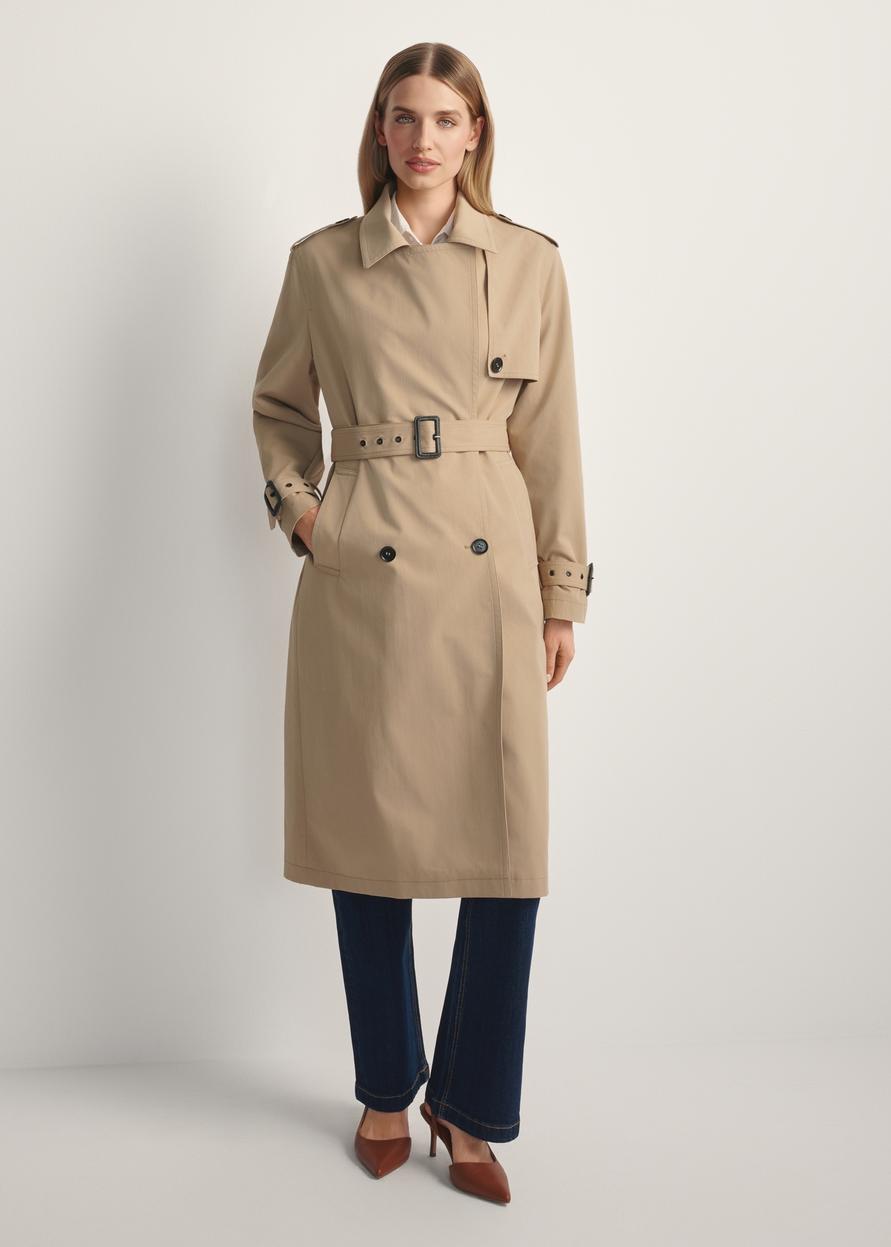 Long beige women's coat KURDT-0512-1C(W26), front view of the product on the model. Full body visible.