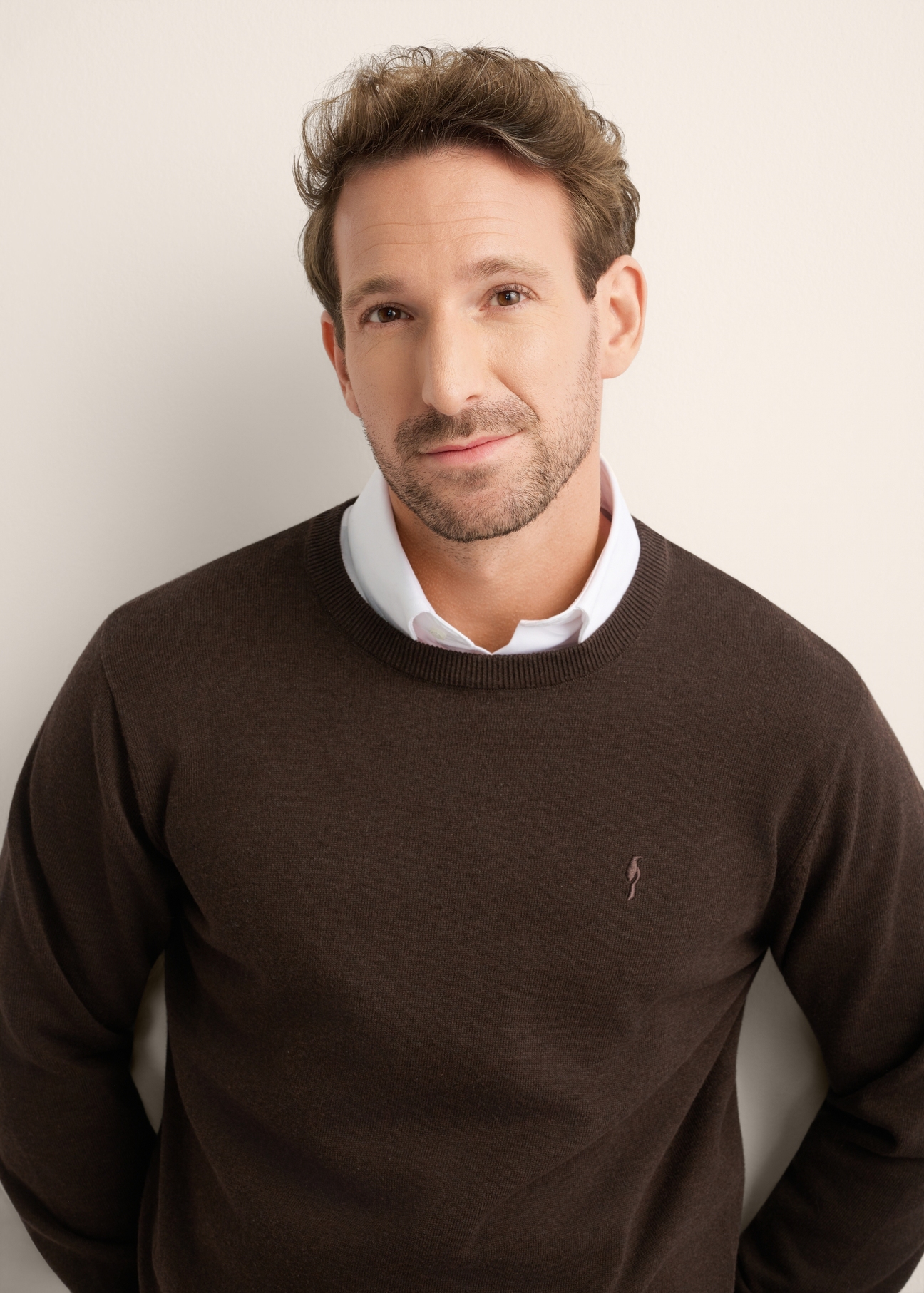 Men's brown cotton sweater SWEMT-0114A-1I(Z26), front product view on model. Half silhouette visible.