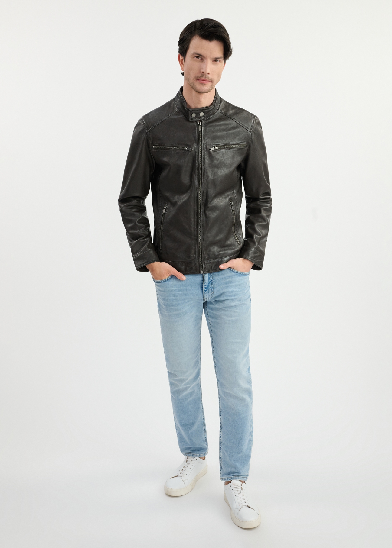 Dark brown men's leather jacket KURMS-0326-1364(W25) - front view on model on white background. Full silhouette visible.