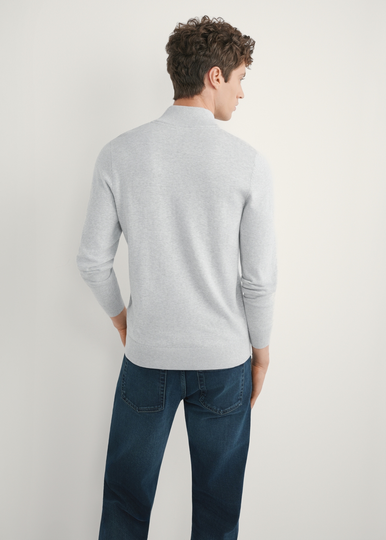 Light gray men's sweater with a stand-up collar SWEMT-0189-9A(W26) - back view of the product, on a model, against a light background. Half of the silhouette visible.