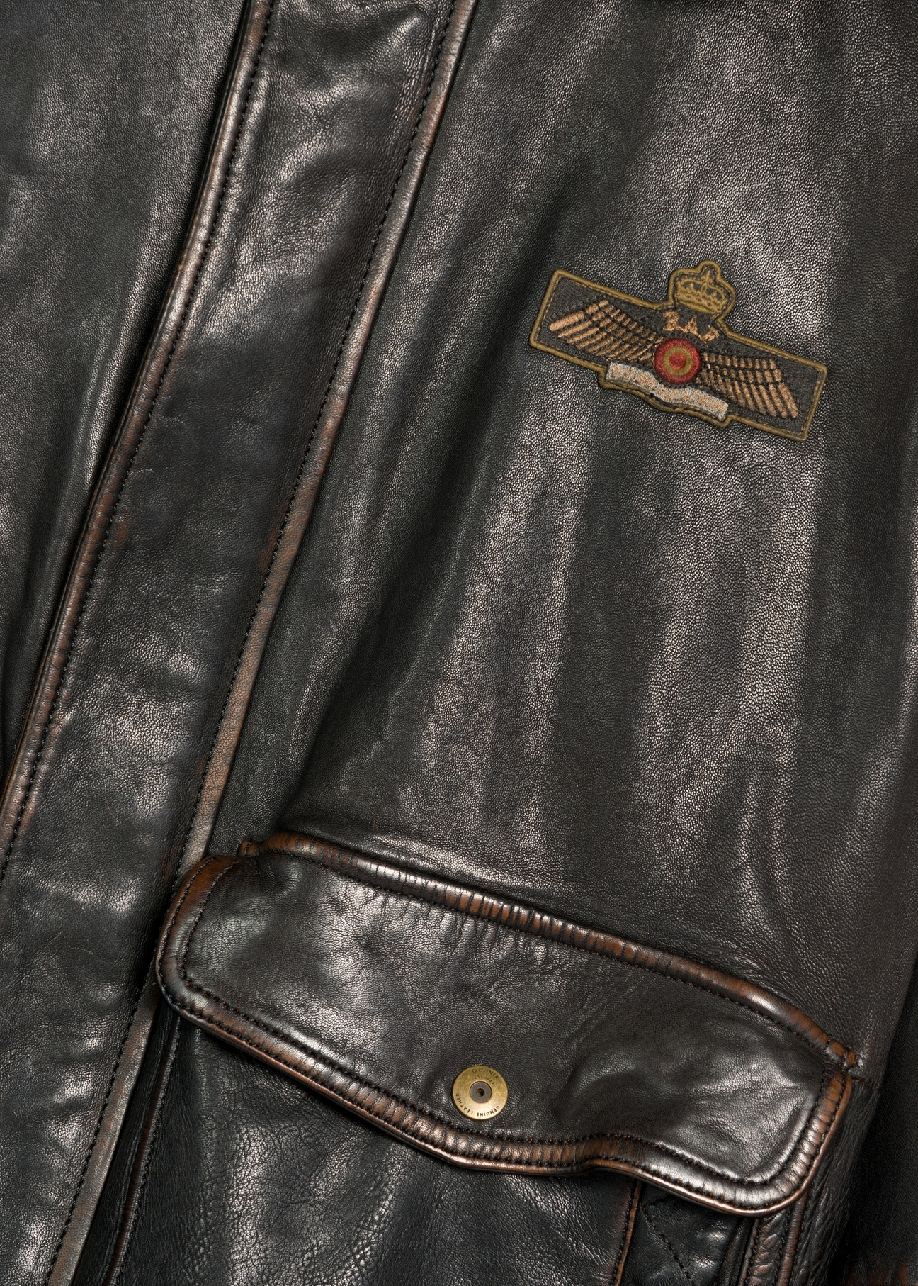 Brown leather jacket with collar KURMS-0380-2877(Z25), close-up of the product detail.