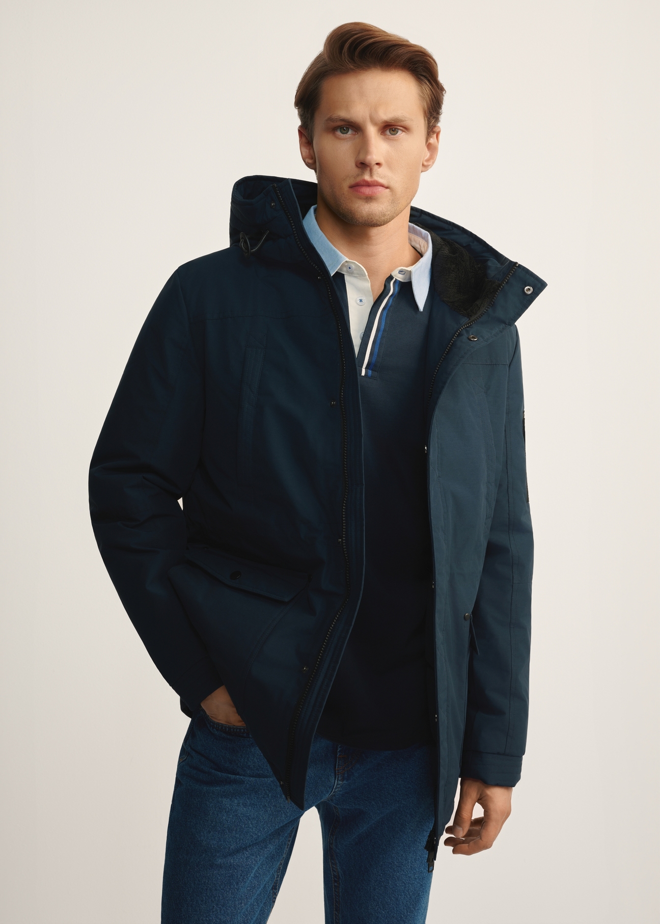 Long men's jacket with hood KURMT-0253-69(Z25) product view, from the front on the model, half of the silhouette visible.