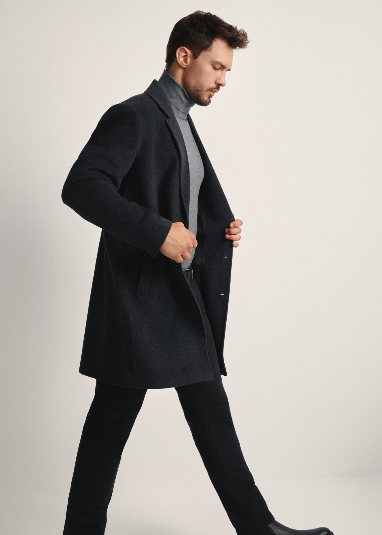 Men's graphite wool coat PLAMT-0006-96(Z25), side view of the product on the model. Half of the silhouette visible.