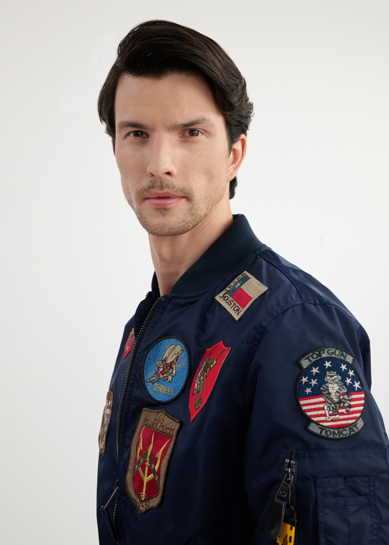 Navy blue men's TOP GUN pilot jacket KURMT-0381-69(W25) - close-up of the front on the model on a white background.