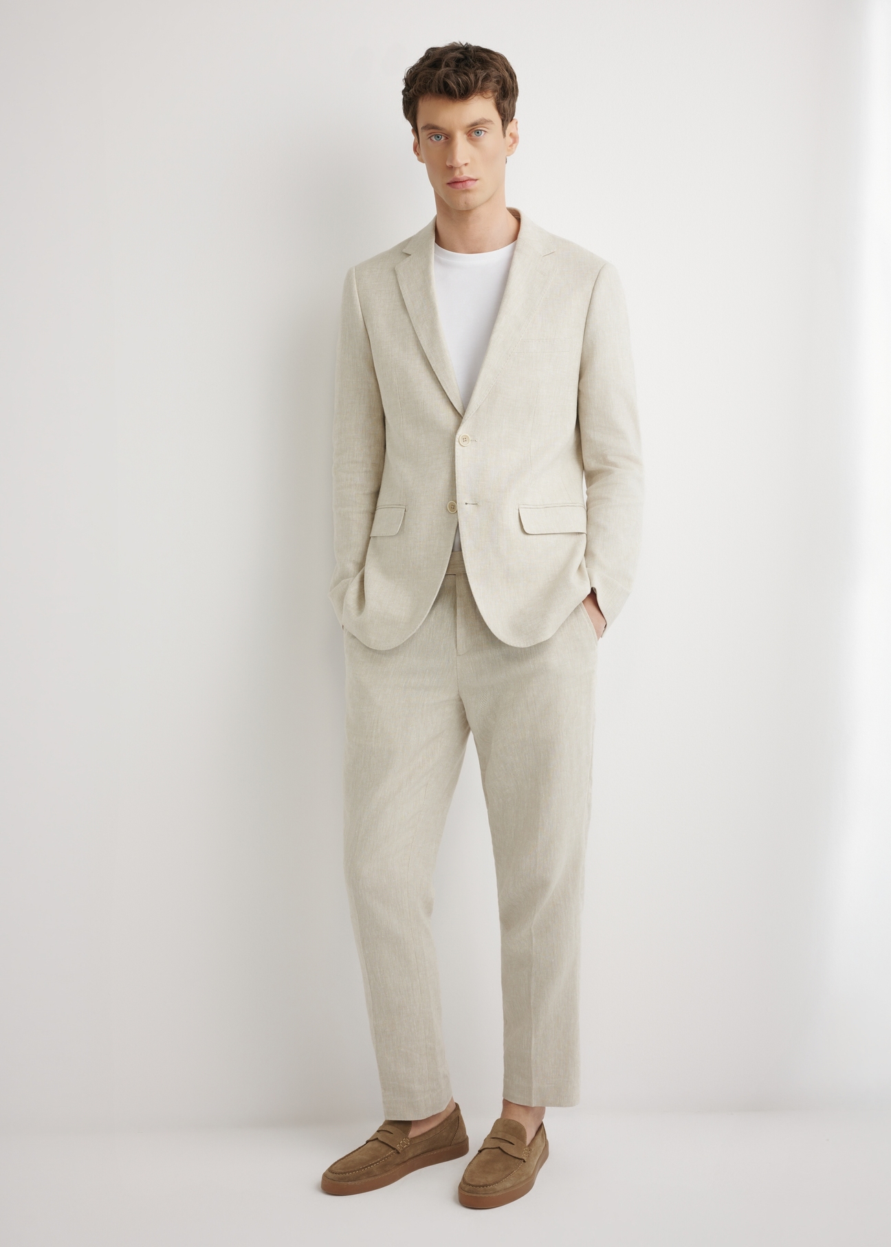 Men's beige herringbone suit trousers SPOMT-0117-1B(W26), front product view on model. Full body visible.