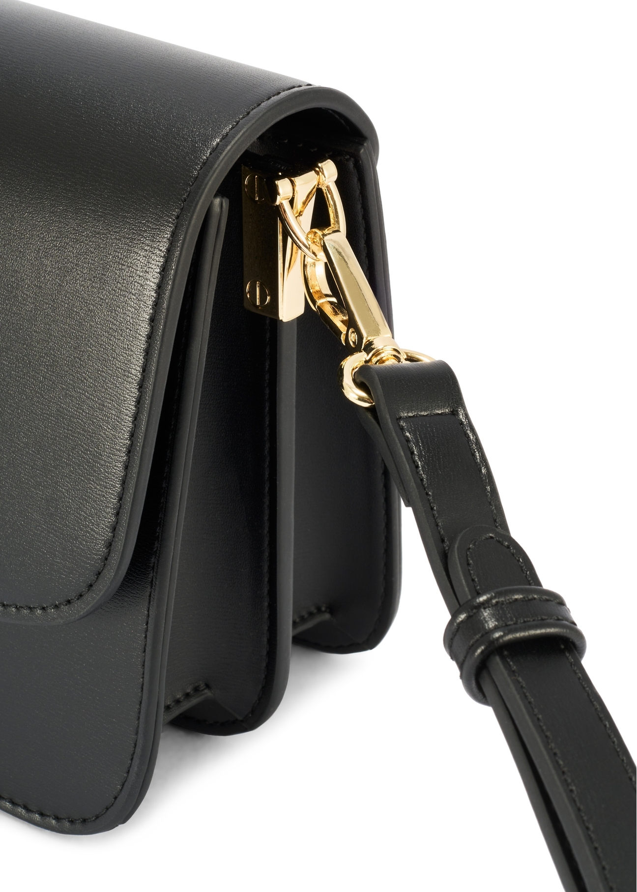 Black women's handbag made of imitation leather TOREC-1081-99(W26), close-up of the product detail on a white background.