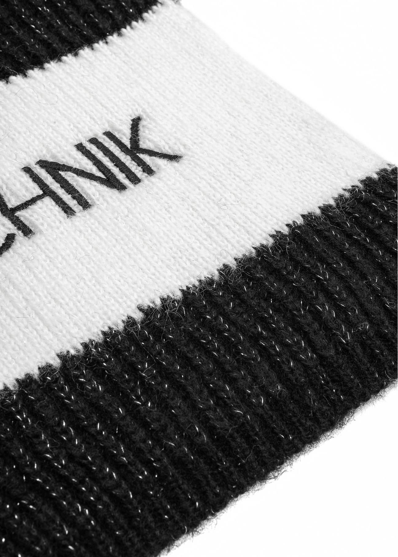 Black hat and scarf set ZESTD-0010-99(Z25) - close-up of the detail on a white background.