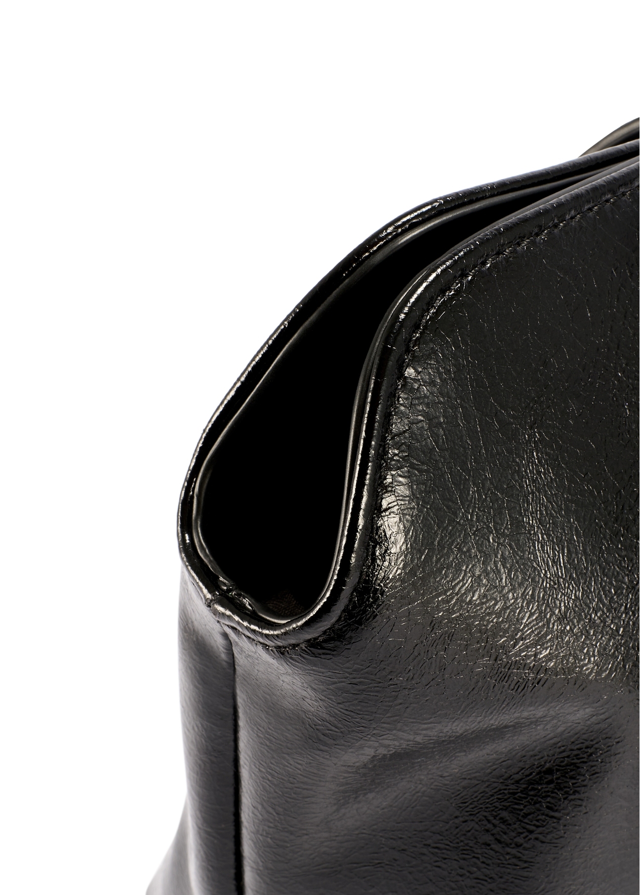 Black women's handbag with gloss TOREC-1205-9F(W26) - close-up of detail, on white background.