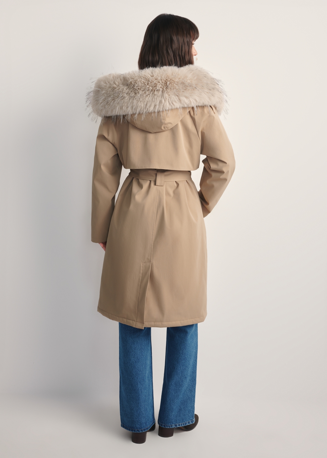 Beige women's winter jacket KURDT-0613-81(Z25) - back view of the product, on a model against a white background. Full body visible.