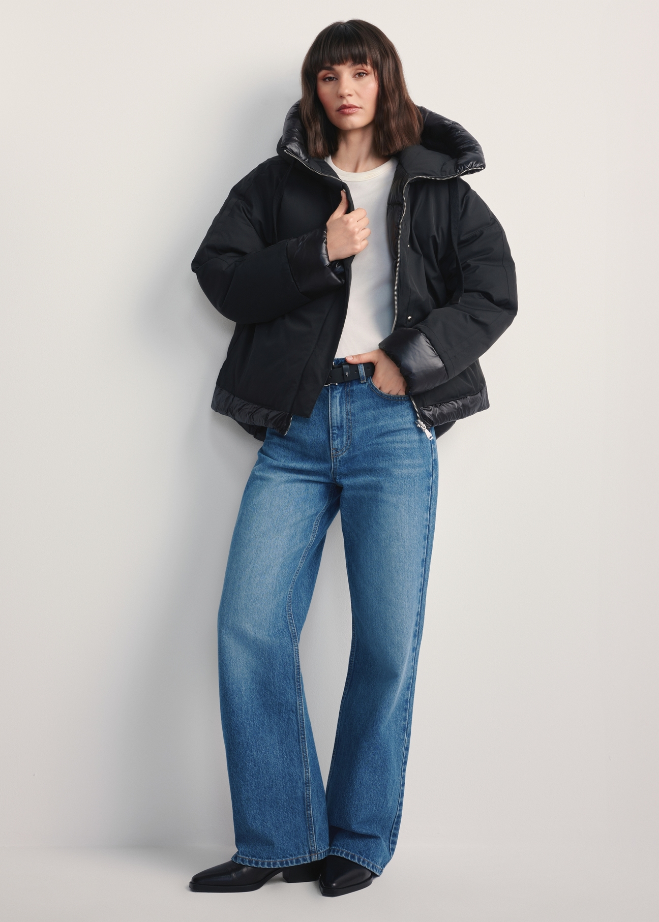 Black oversized women's jacket KURDT-0605-99(Z25), front view of the product on the model. Full body visible.