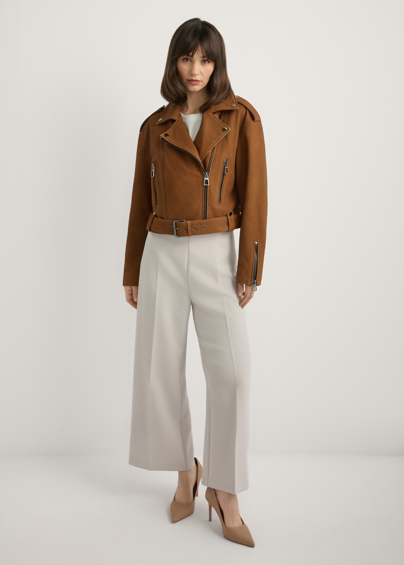 Cognac leather biker jacket KURDS-0610-1F(W26), front view of the product on the model. Full body visible.