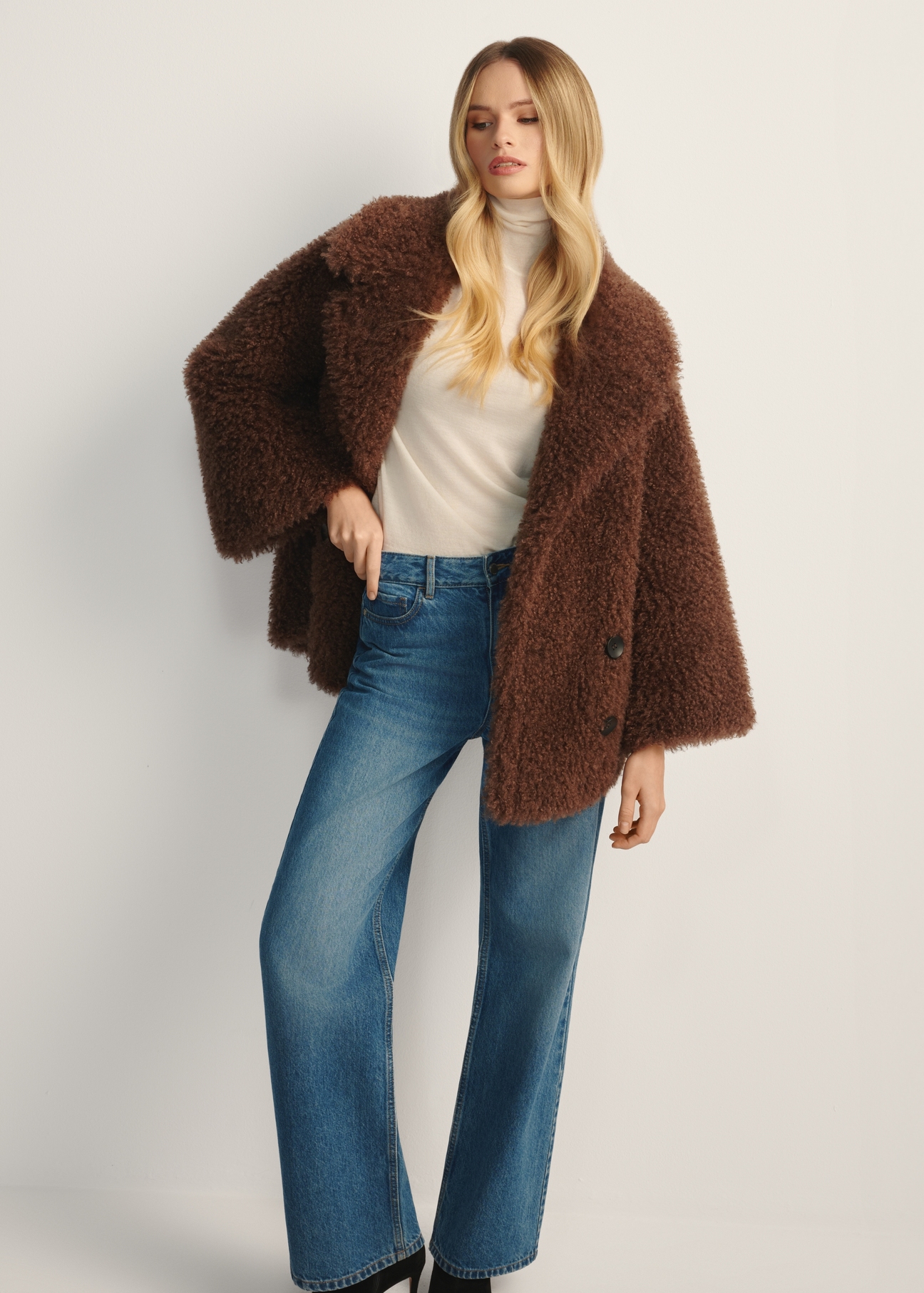 Brown short women's fur coat FUTDP-0076-89(Z25), product view from the front on the model, half of the silhouette visible.