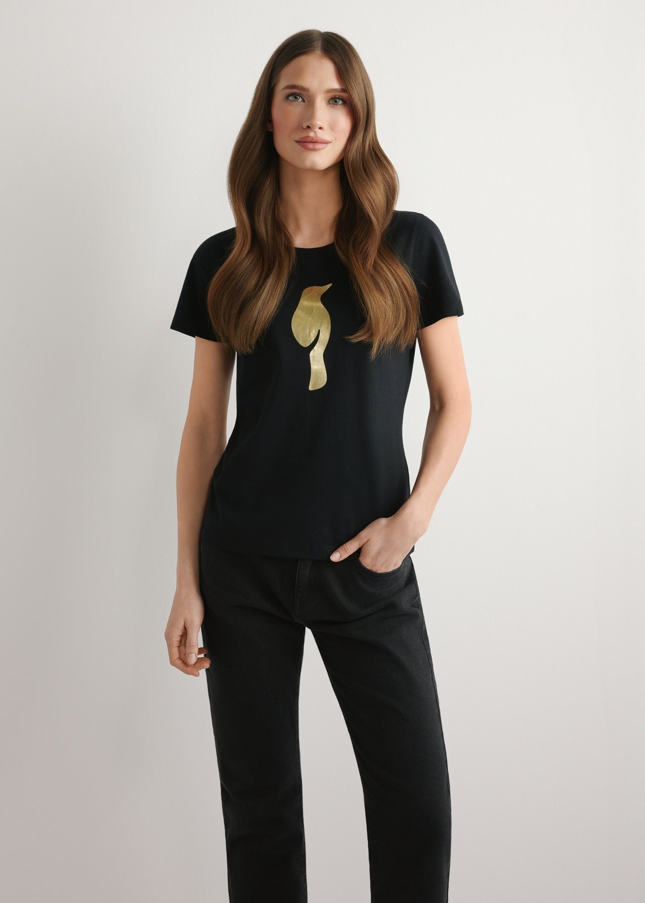 Black women's T-shirt with logo TSHDT-0155-99(W26), front view of the product on the model. Half of the silhouette visible.