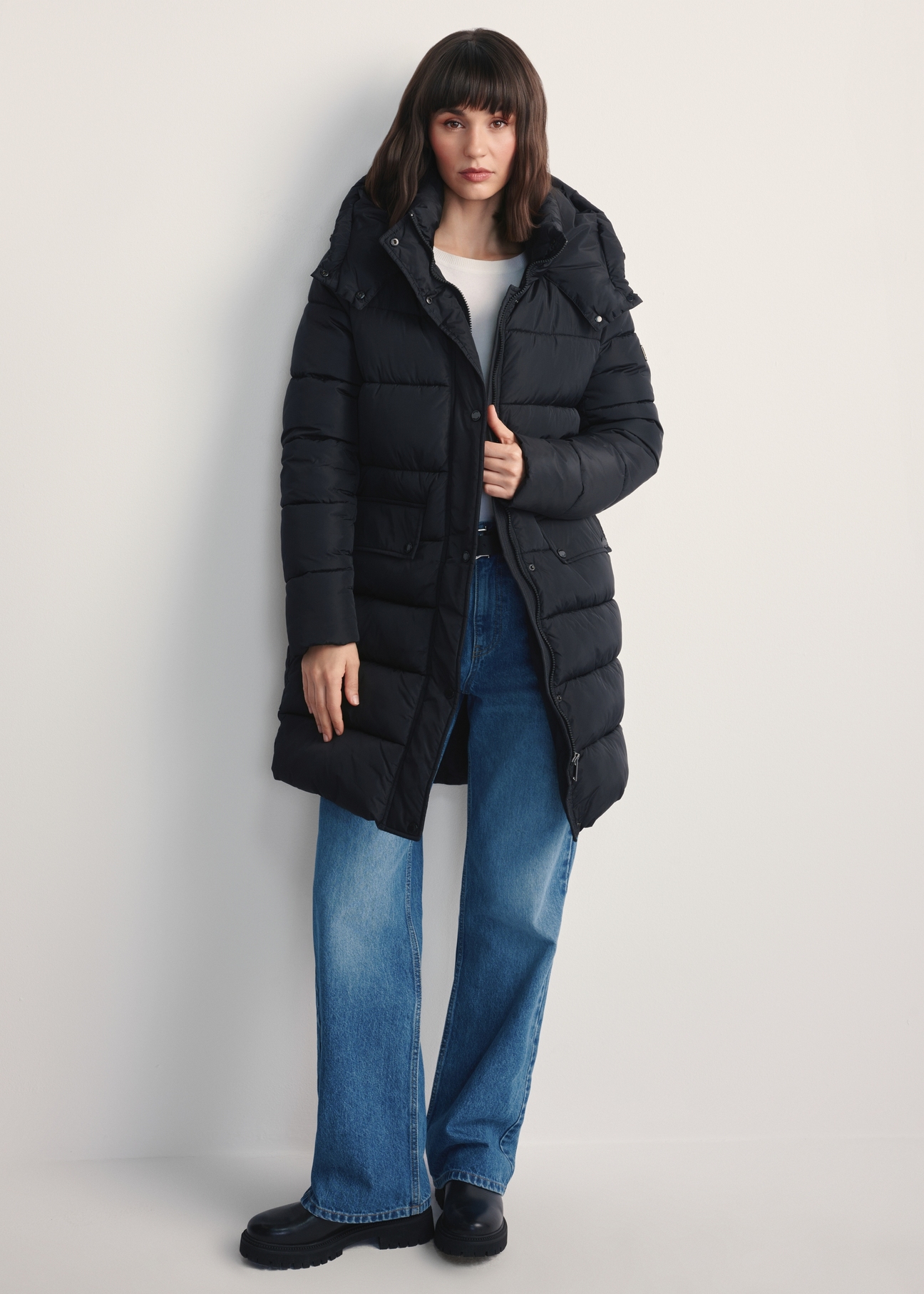 Women's black winter jacket KURDT-0600-99(Z25) - front view of the product on a model against a white background. Full body visible.