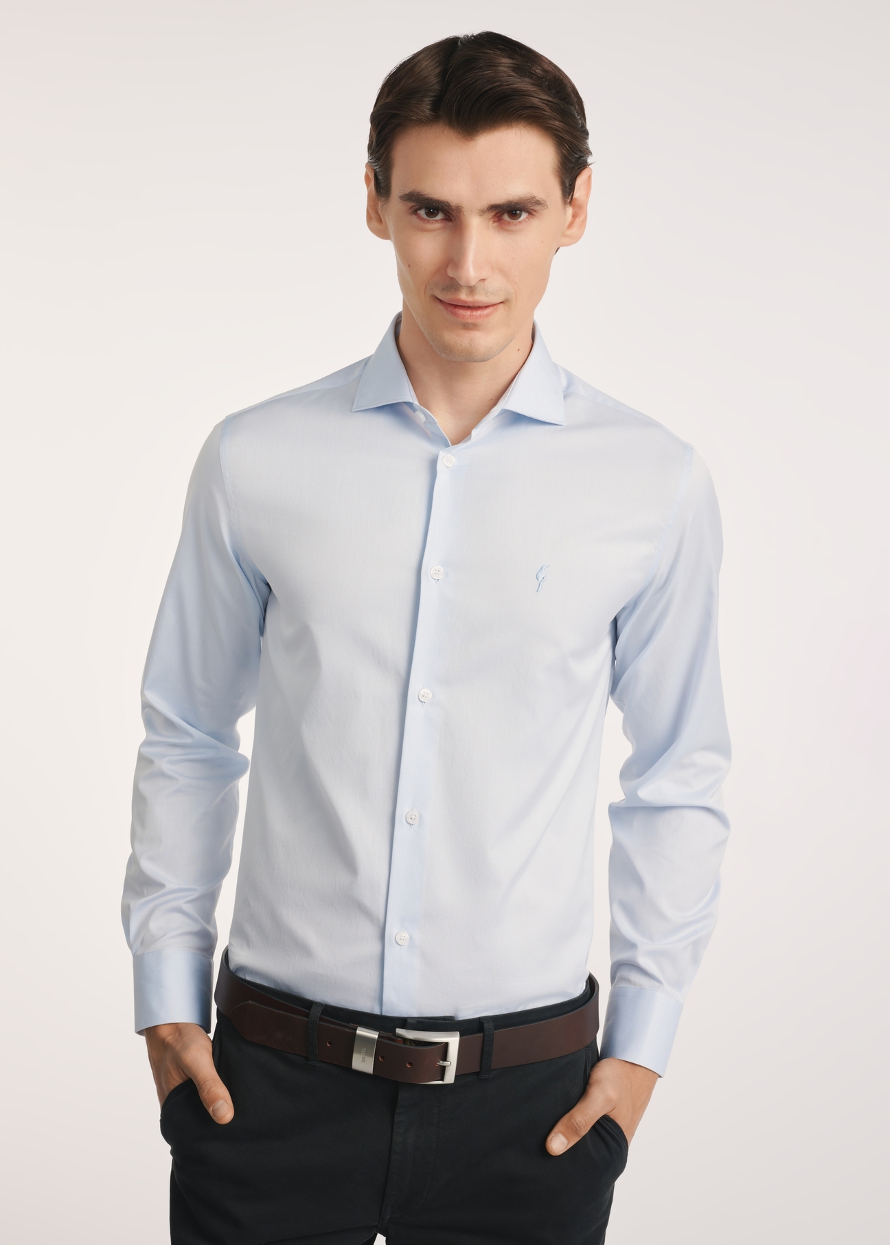 Light blue men's shirt KOSMT-0352-62(Z25), product view from the front on the model, half of the silhouette visible.