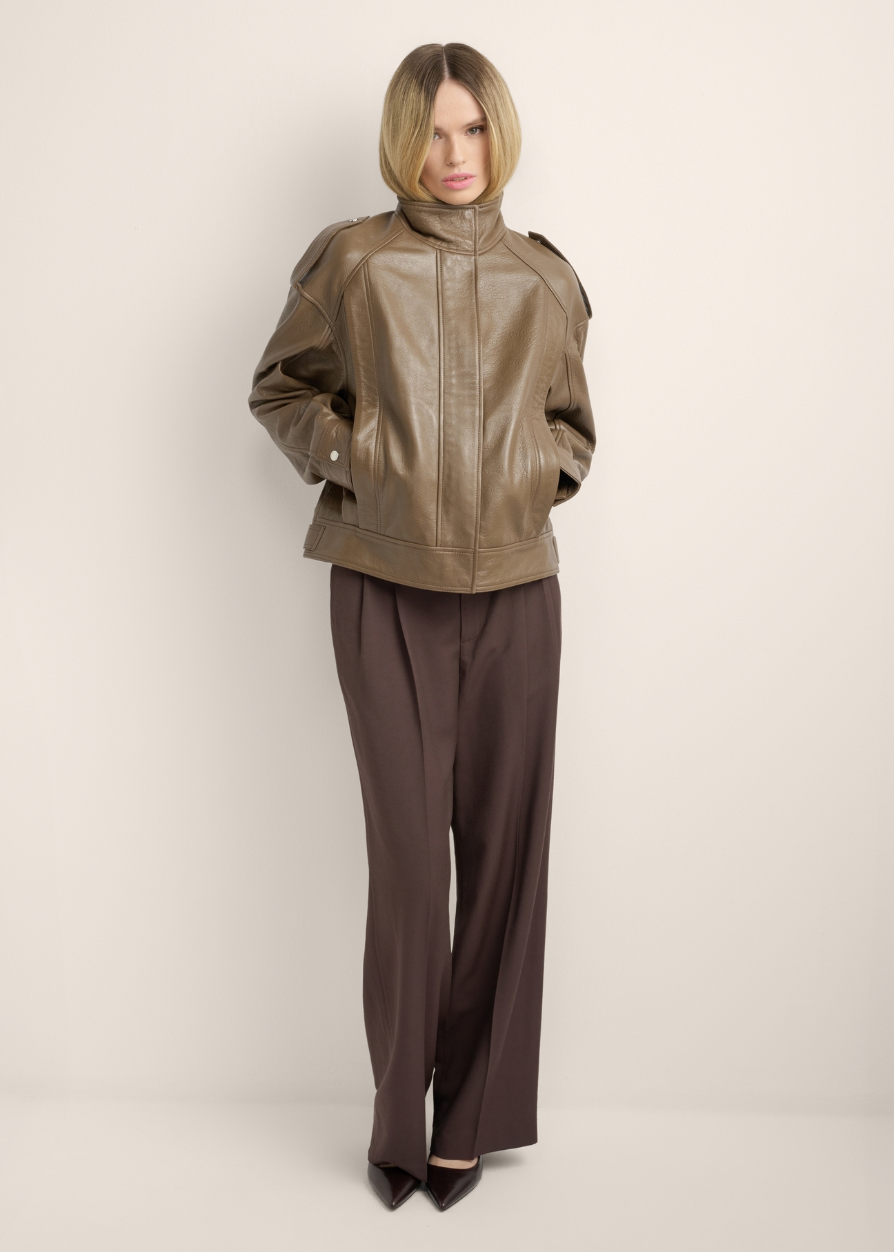Brown oversized women's leather jacket KURDS-0648-9B(Z26), front view of the product on the model. Full body visible.