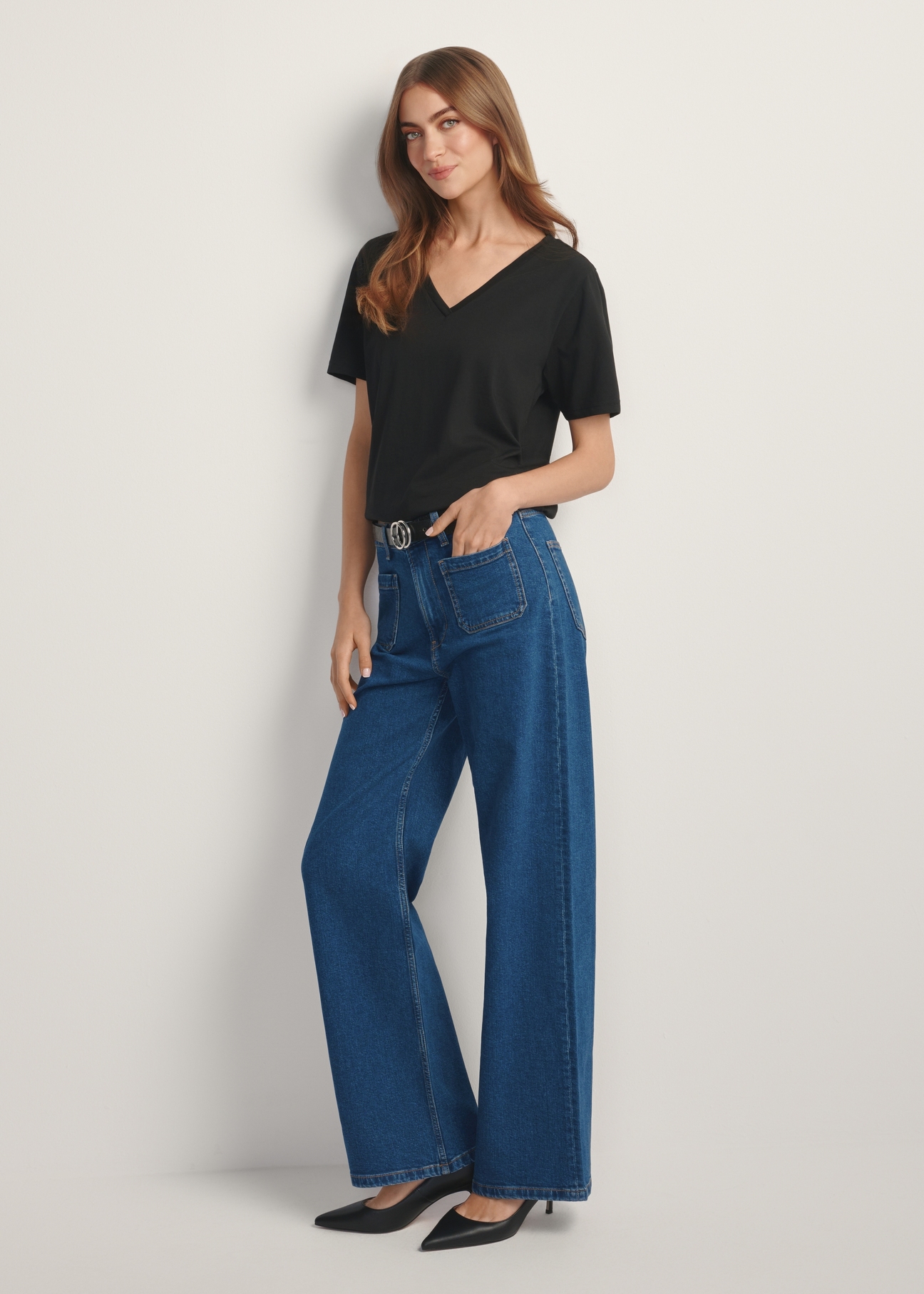 Black basic women's T-shirt TSHDT-0120-99(W25), product view from the front on the model, the whole silhouette is visible.