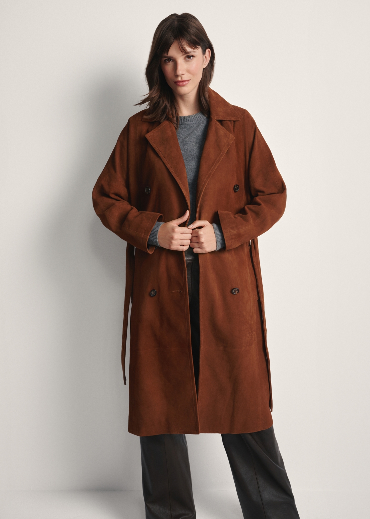 Women's brown oversized suede coat KURDS-0551-0775(Z25), front view of the product on the model. Half of the silhouette visible.