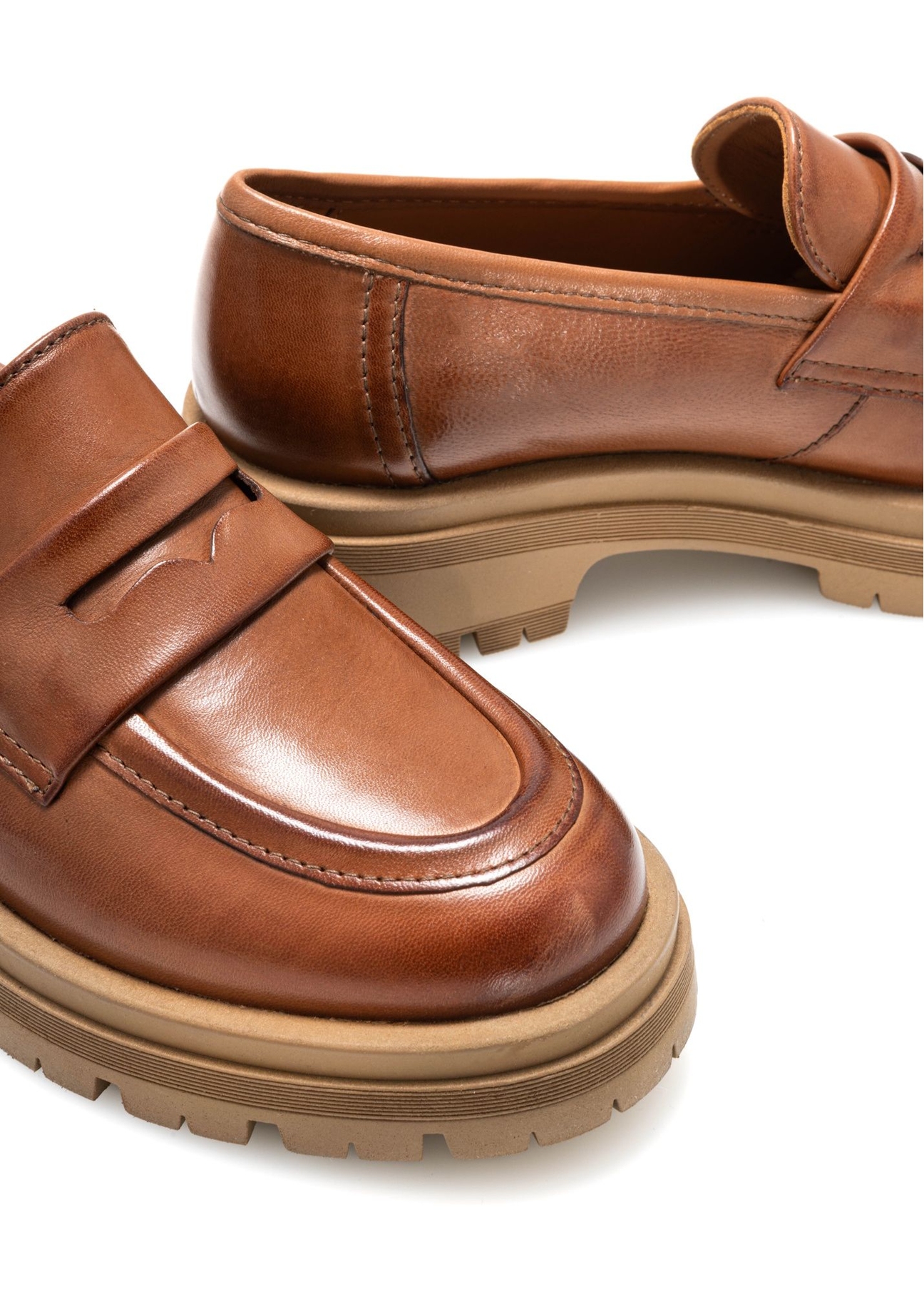 Women's leather moccasins in cognac color BUTYD-1187-1F(Z26), close-up of the product on a white background.
