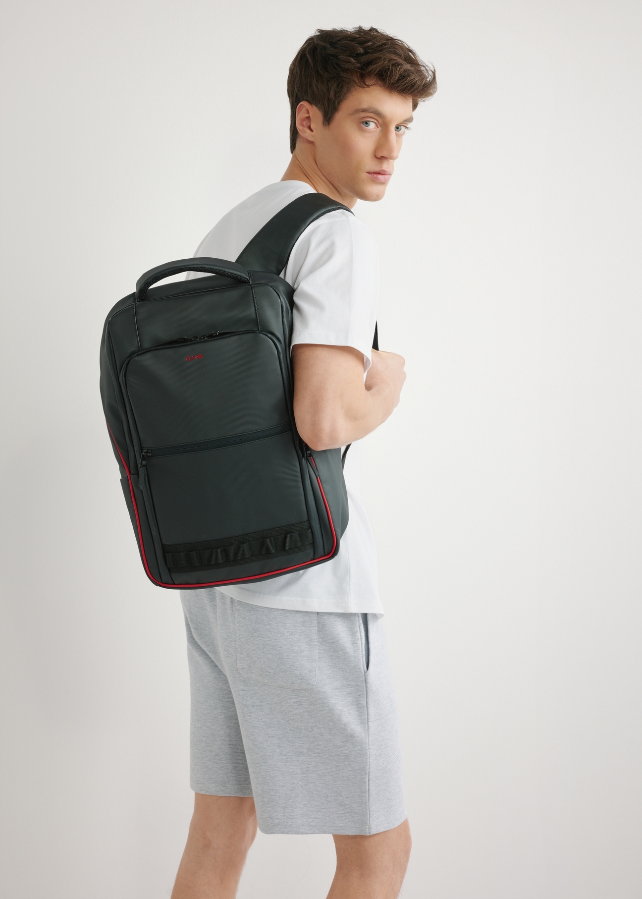 Black large men's backpack TORMN-0396-9J(W26), product view on the model's silhouette.