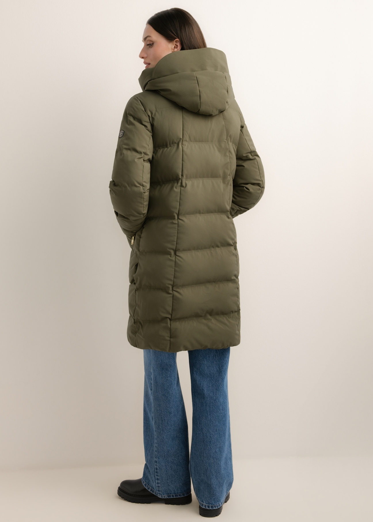 Women's khaki winter jacket KURDT-0700-8D(Z26), back view of the product on the model. Full body visible.