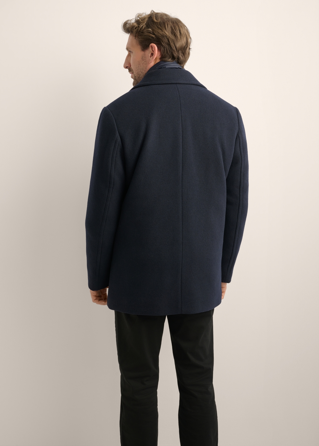 Men's dark navy wool coat PLAMT-0012-7E(Z26), back view of the product on the model. Half of the silhouette visible.
