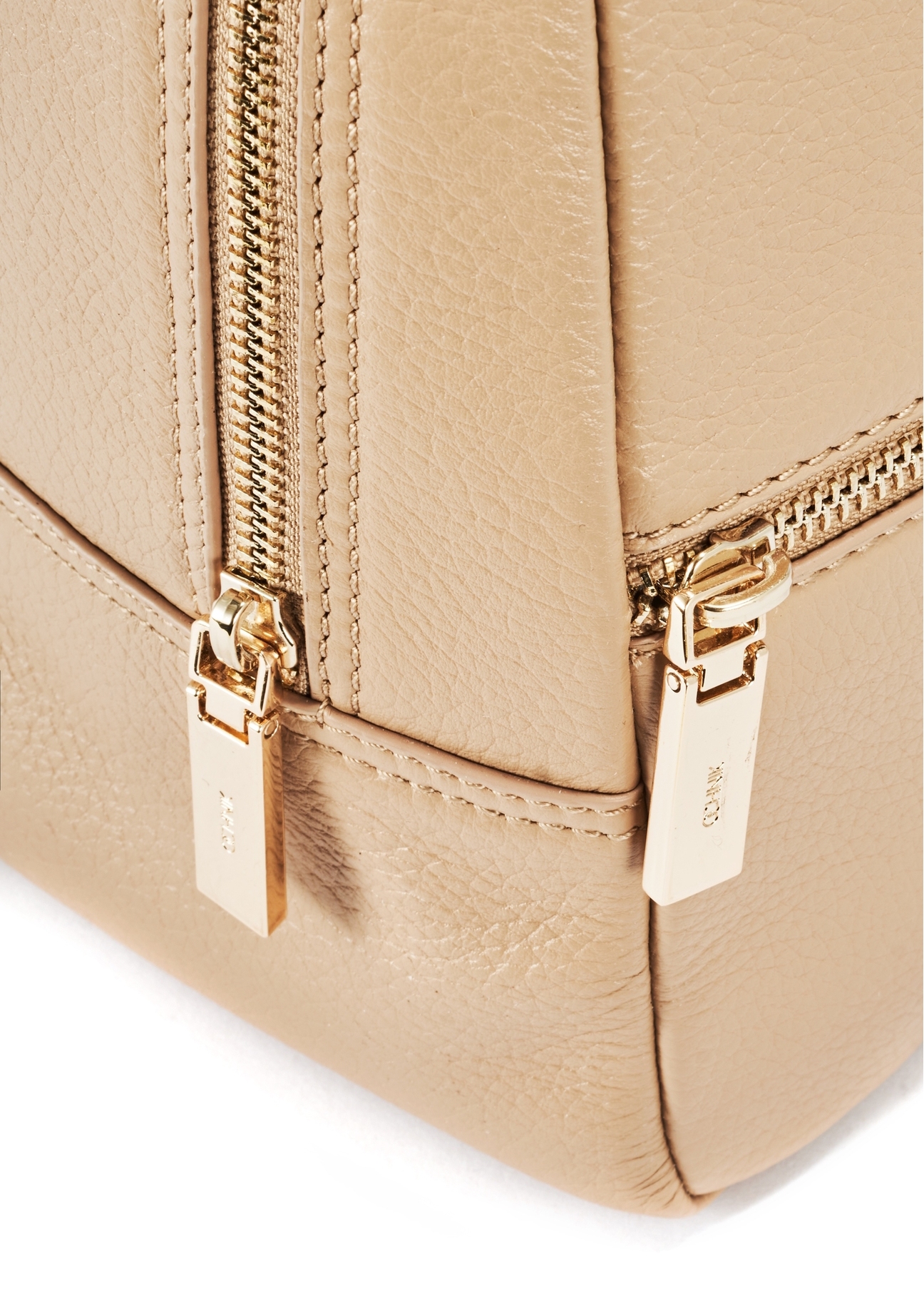Beige leather women's backpack TORES-0898D-81(Z25), detail view of the product on a white background, close-up of the zipper.