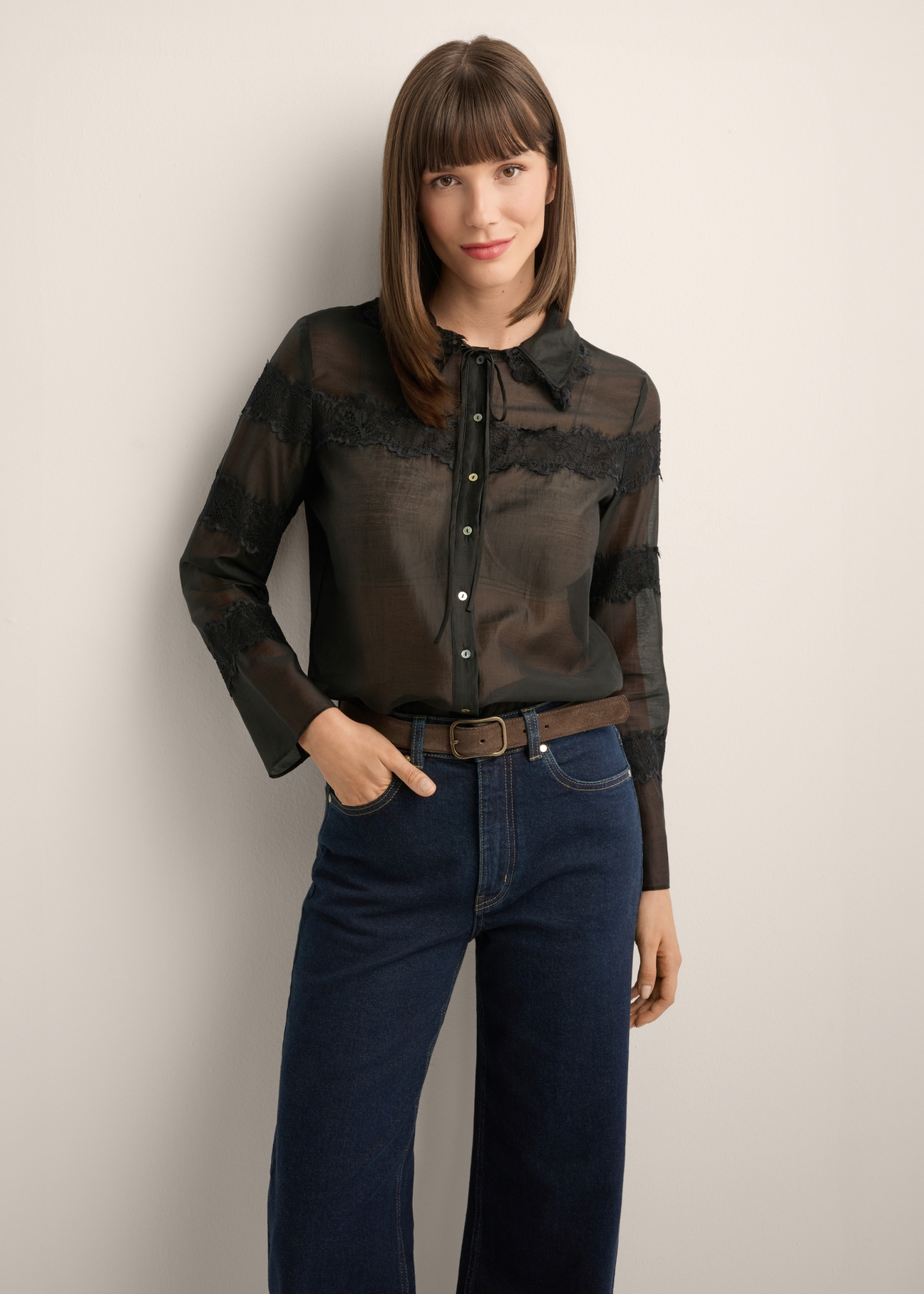 Women's black lyocell shirt KOSDT-0194-99(Z26), front view of the product on the model. Half of the silhouette visible.