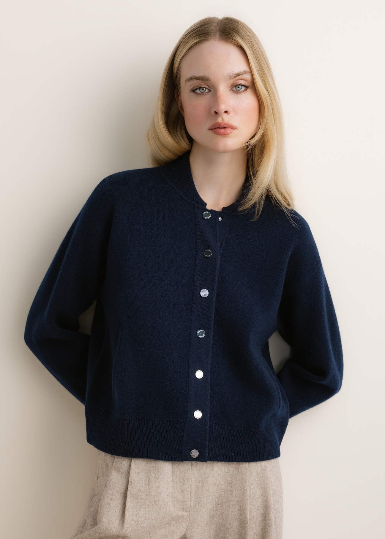 Dark navy blue women's wool and cashmere cardigan KARDT-0073-7E(Z26), front view on a model. Half-body shot.