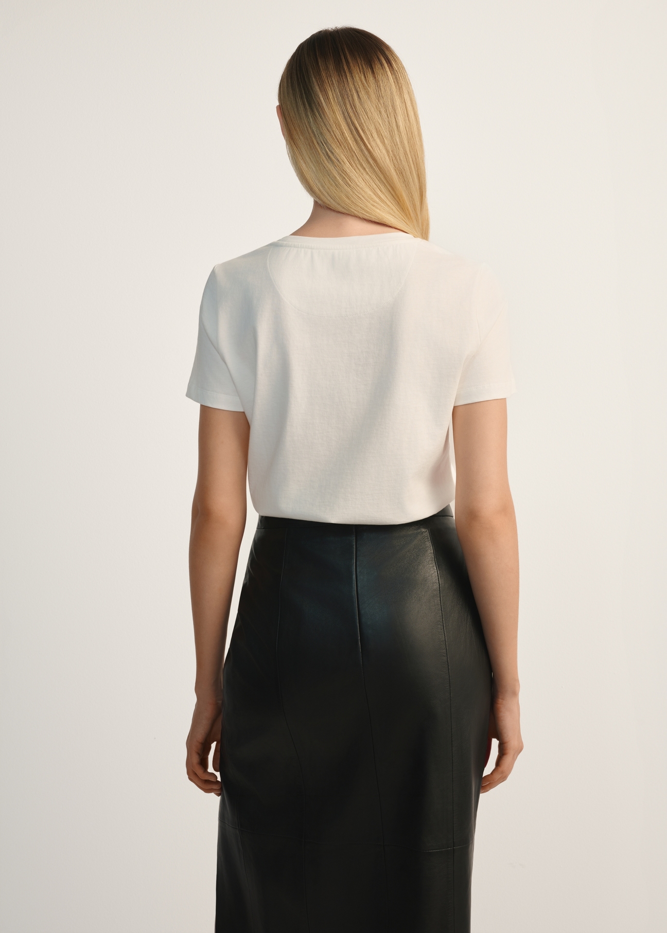Cream women's T-shirt with logo TSHDT-0148-12(Z25), back view of the product on the model. Half of the silhouette visible.