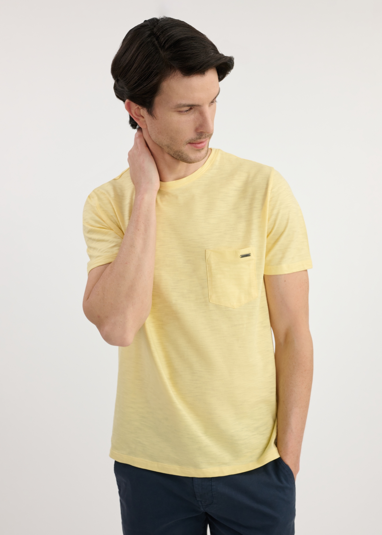 Yellow cotton men's t-shirt TSHMT-0121-21(W25), front view of the product on the model. Half of the silhouette visible.