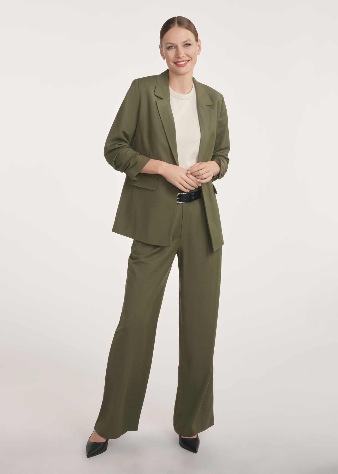 Women's khaki blazer ZAKDT-0043-55(Z25), front view of the product on the model. The entire silhouette is visible.