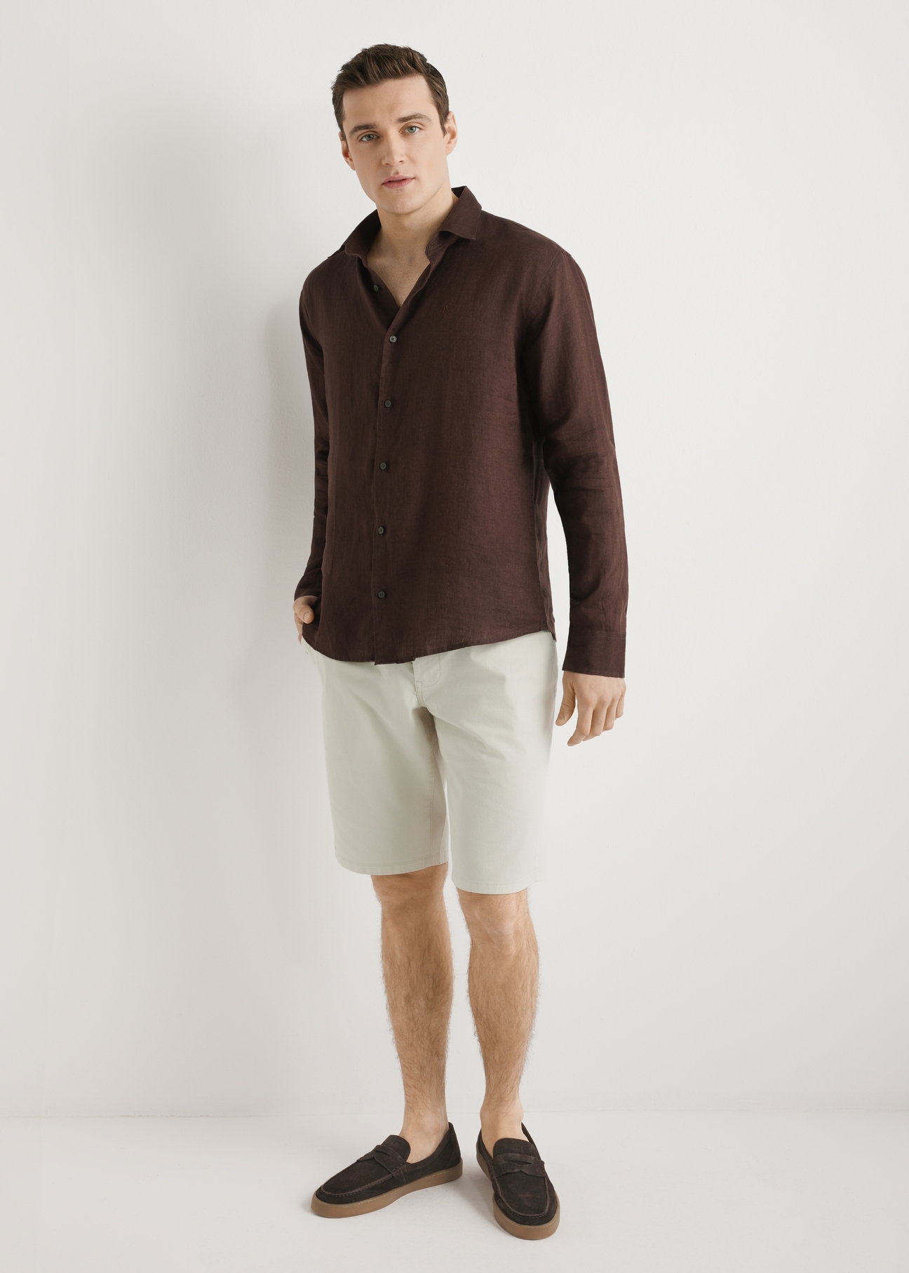 Brown men's linen shirt KOSMT-0321A-1I(W26) - front view of the product, on a model, against a light background. Full silhouette visible.