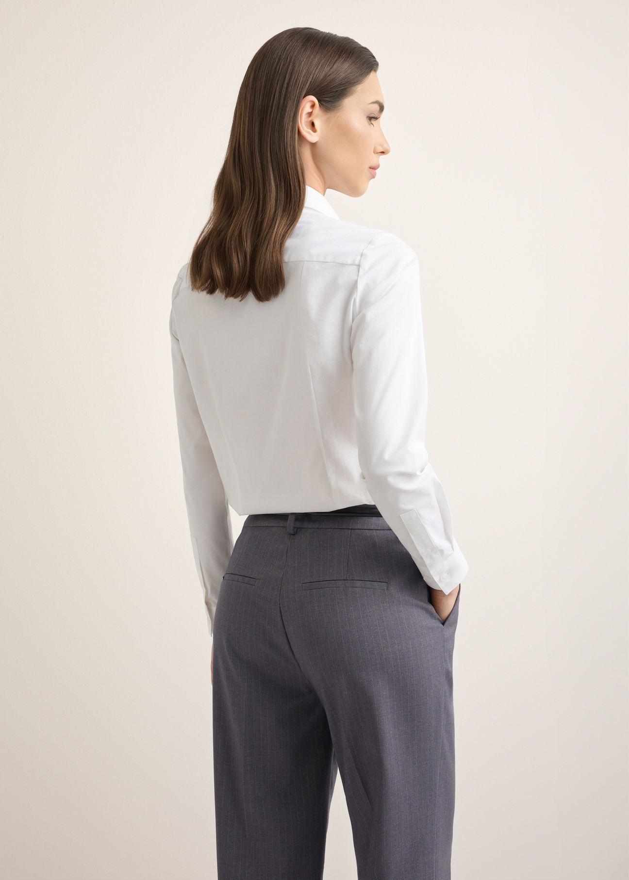 Women's white cotton shirt KOSDT-0190-0A(Z26), product view from the back on the model, half of the silhouette visible.