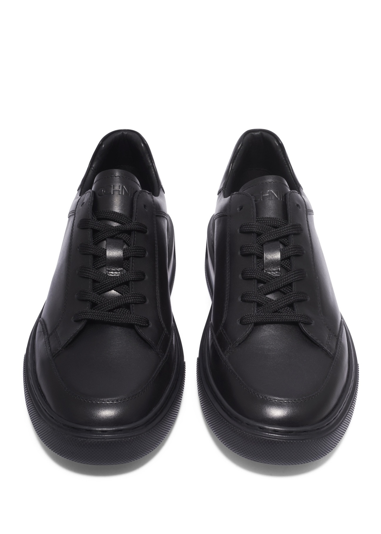 Black leather men's sports shoes BUTYM-0574-99(Z26), front product view on white background.