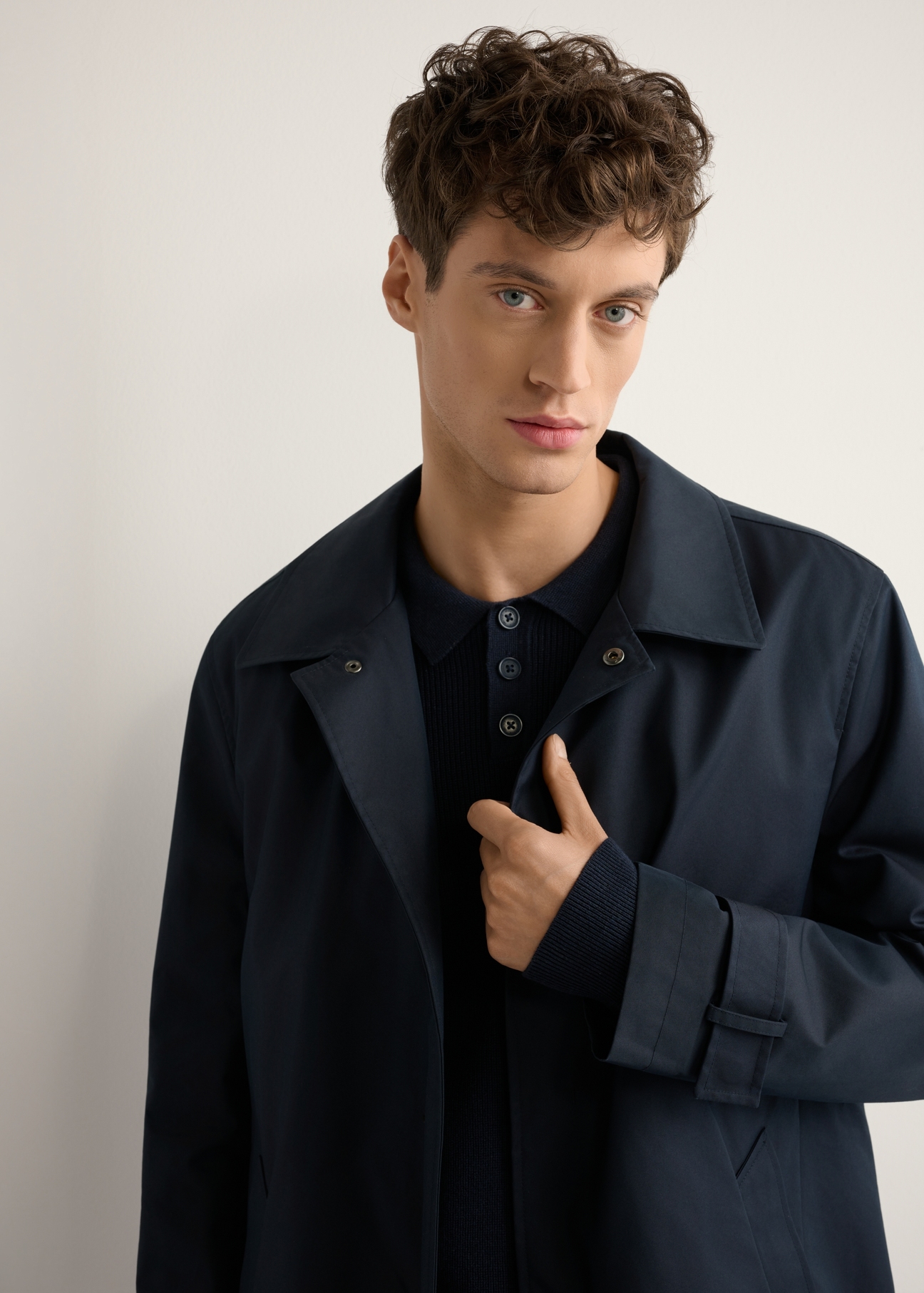 Men's navy blue insulated jacket KURMT-0408-7D(W26) - front view of the product, modeled against a light background. Half-length silhouette visible.