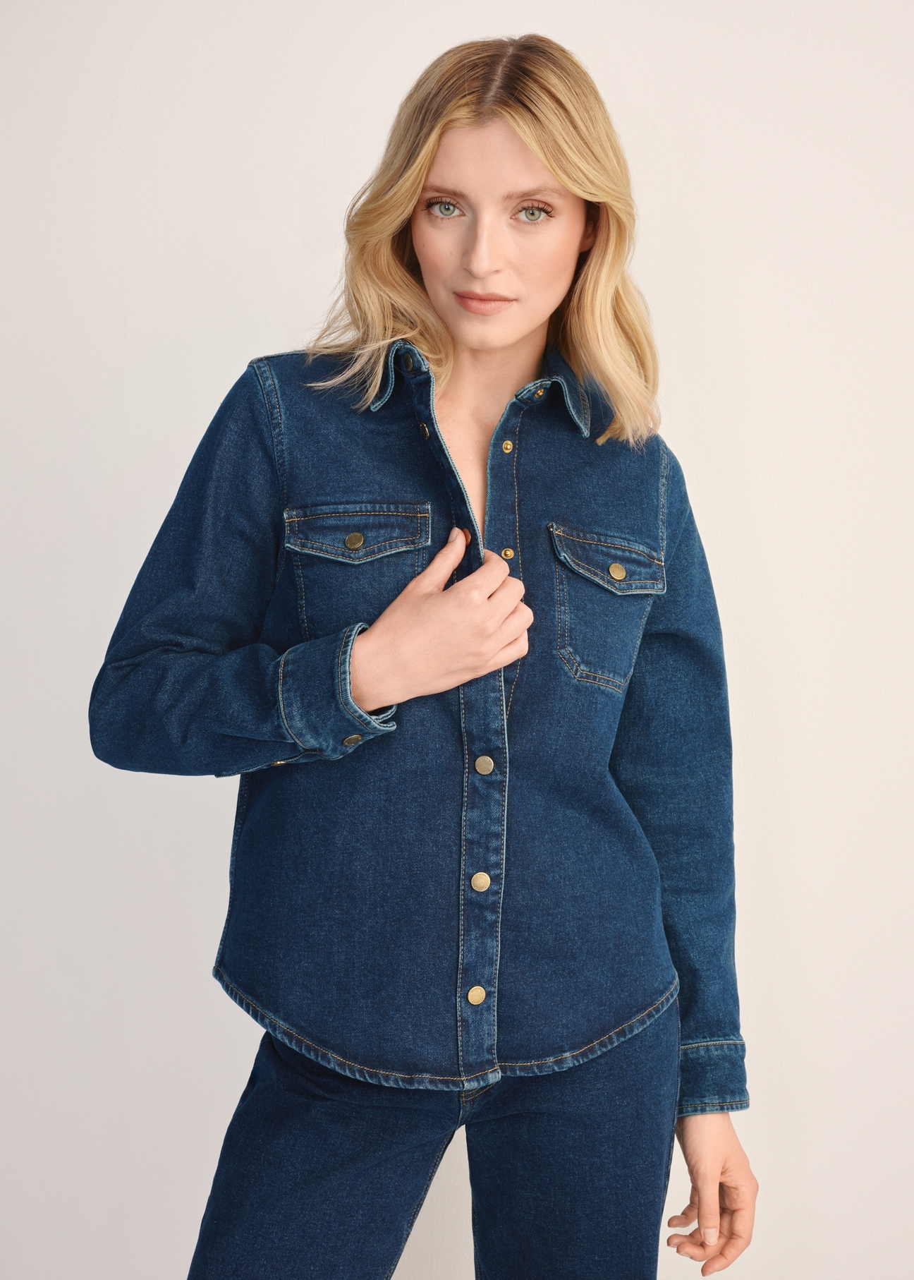 Navy blue denim women's shirt KOSDT-0170-69(Z25), front view of the product on the model. Half of the silhouette visible.