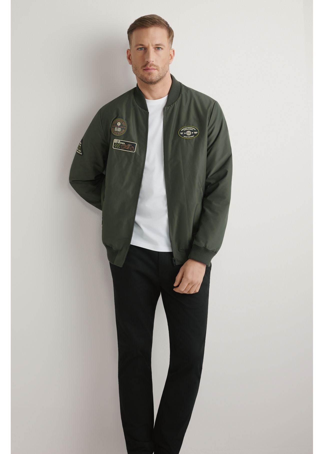 Men's khaki bomber jacket KURMT-0413A-8D(W26) - front product view against a light background. Full body visible.