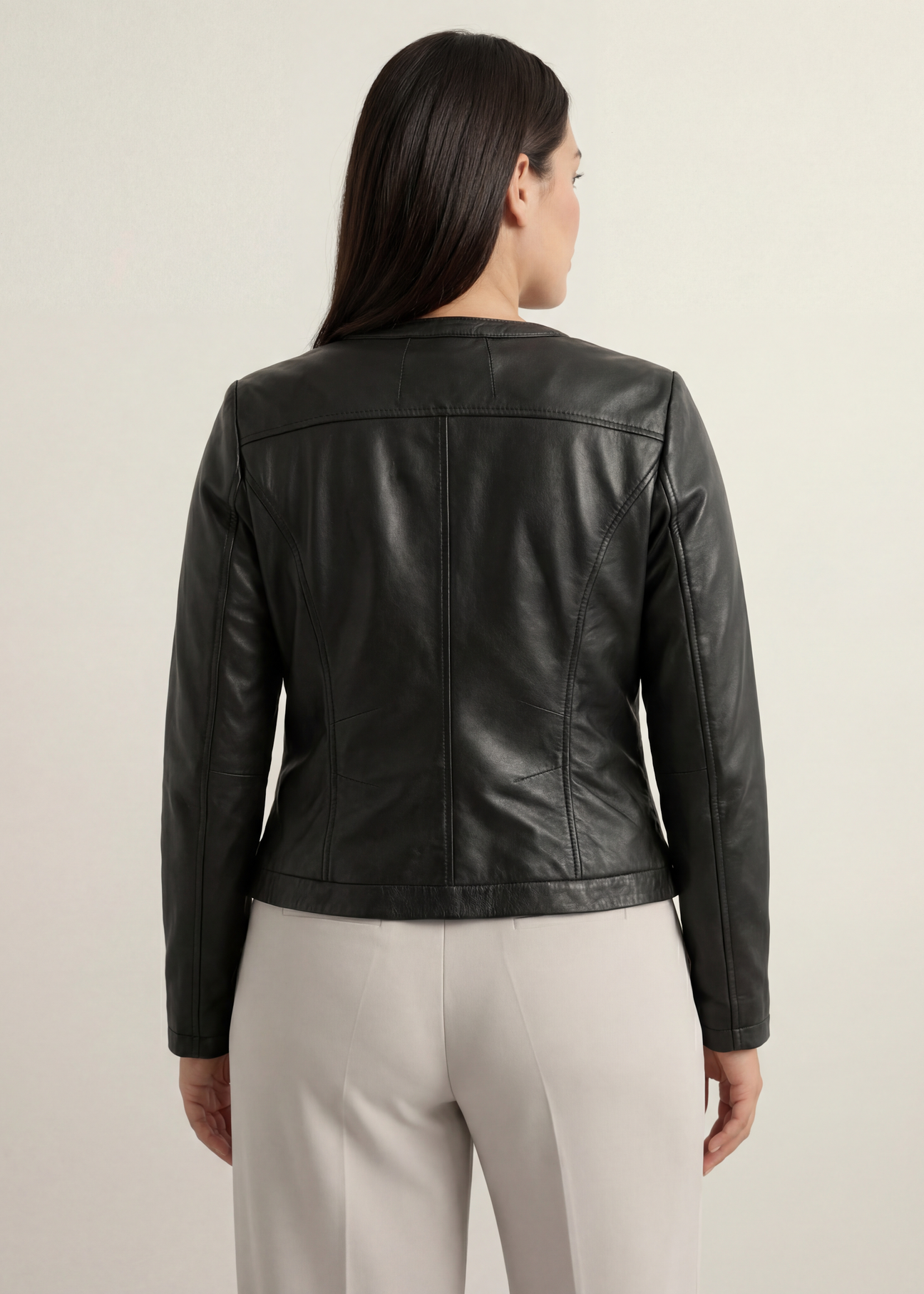 Black women's leather jacket KURDS-0154 L-99(W26), product view from the back on the model.