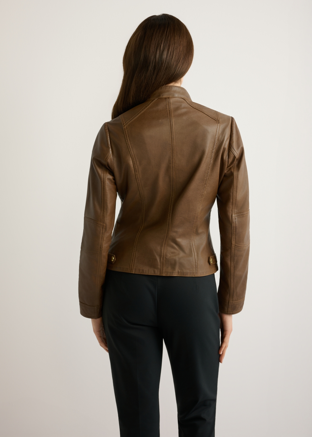 Women's brown leather jacket KURDS-0602-1F(W26), back view of the product on the model. Half of the silhouette visible.