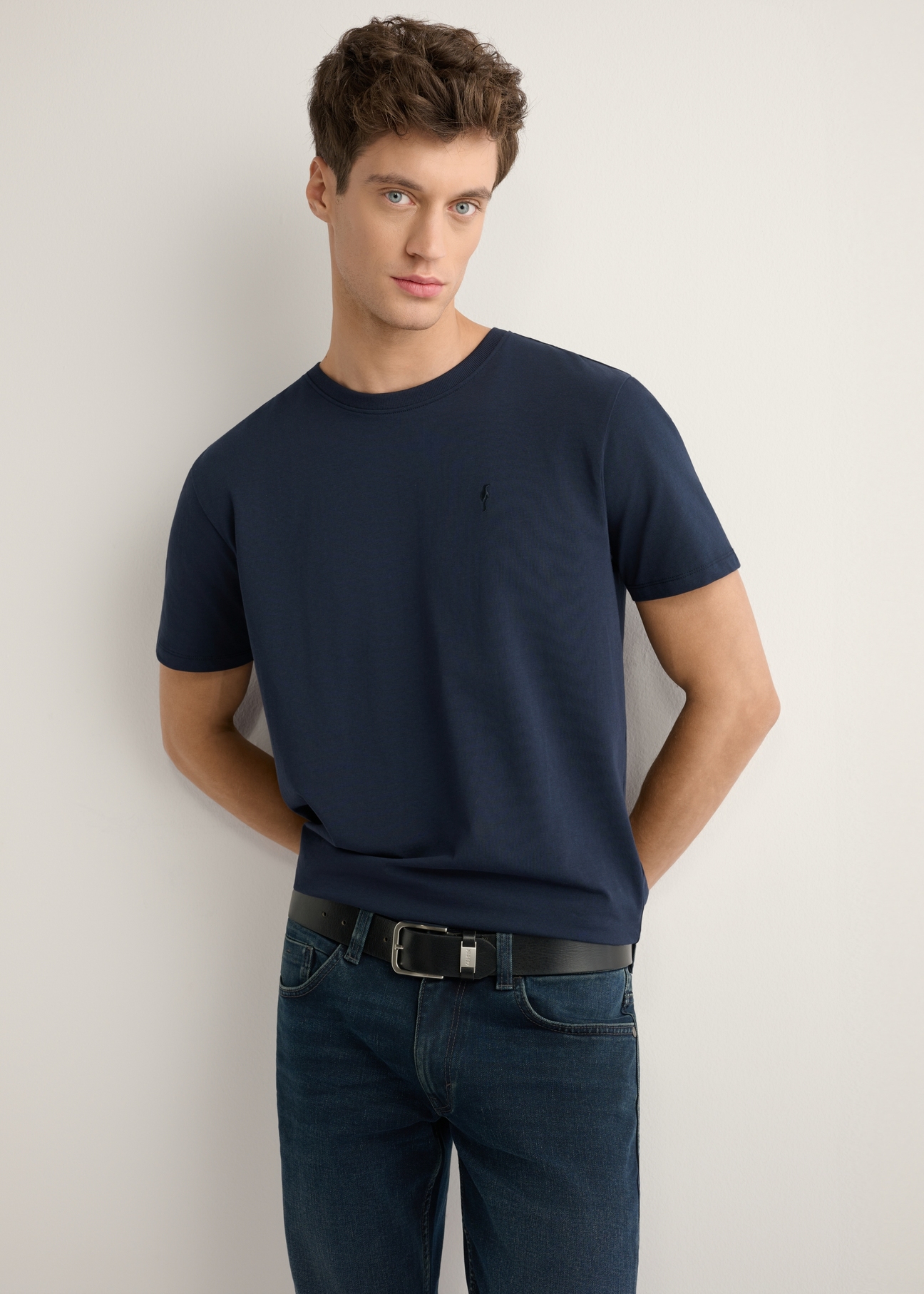 Men's navy blue T-shirt TSHMT-0120-7E(W26), front view of the product on the model. Half of the silhouette visible.