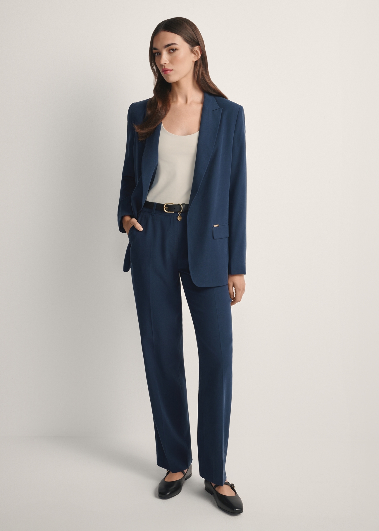 Women's navy blue blazer ZAKDT-0031A-7E(W26), front view of the product on the model. Full body visible.