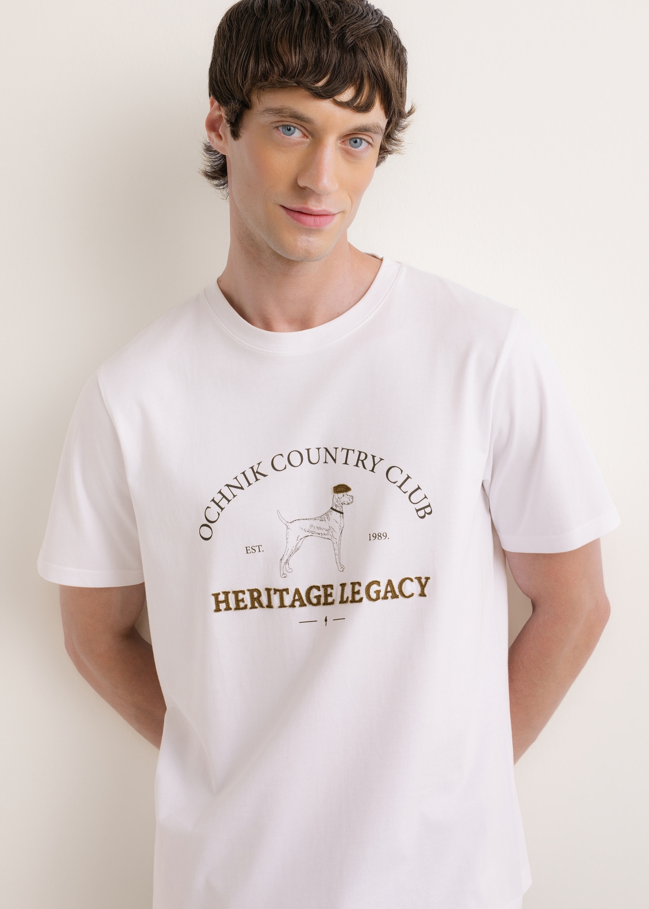 White cotton men's T-shirt TSHMT-0161-0A(Z26), front view of the product on the model. Half of the silhouette visible.