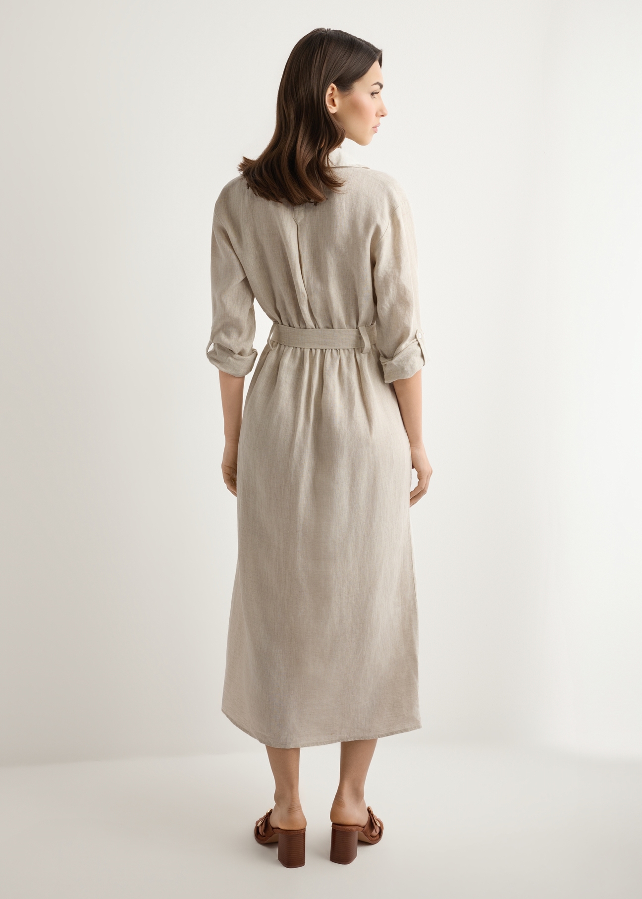Beige linen midi dress SUKDT-0282-1A(W26), back view of the product on the model. Full silhouette visible.