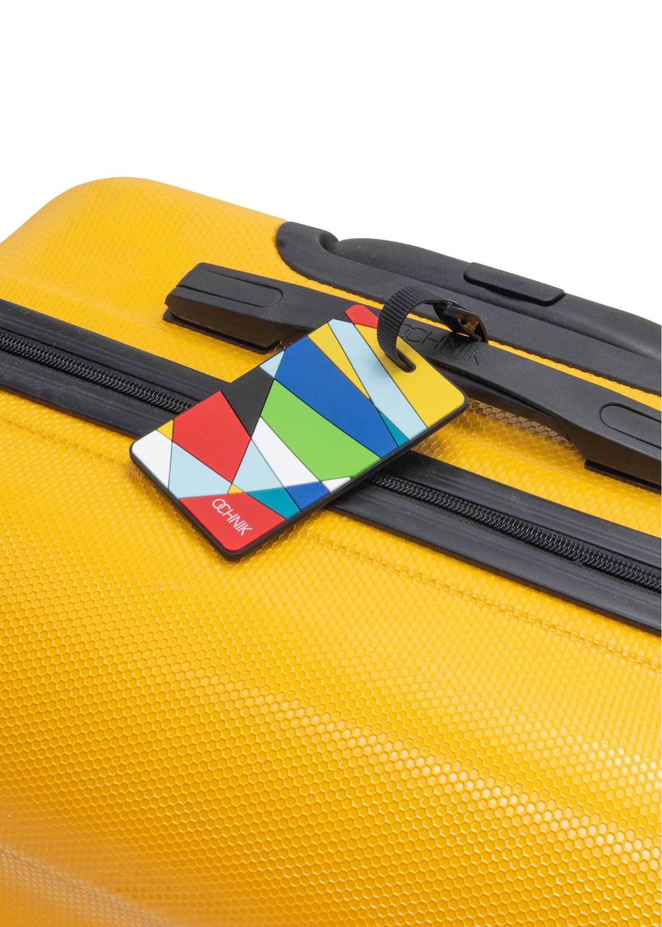 Luggage tag AW-012-0005-15(W25), front view of the product attached to a yellow suitcase.