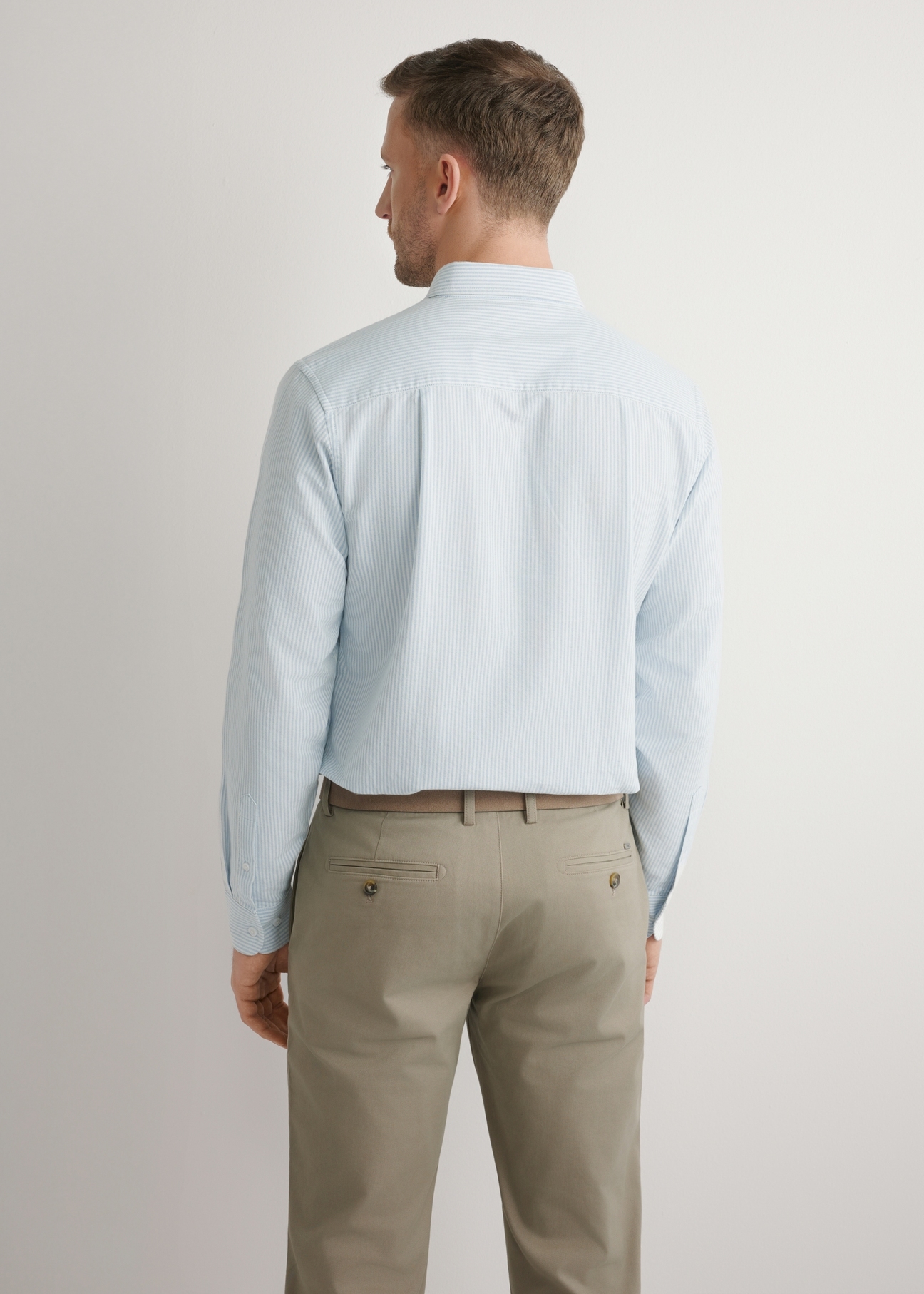 Men's blue cotton striped shirt KOSMT-0354-7B(W26), back view of the product on the model. Half of the silhouette visible.